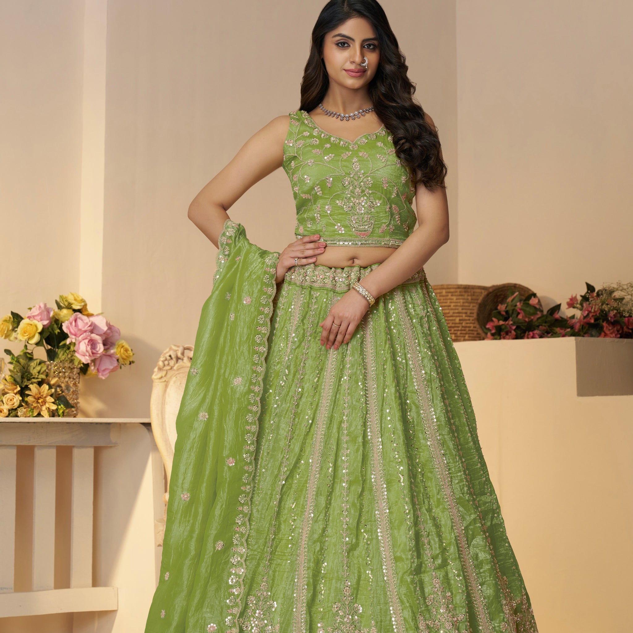 Green Jimmy Choo bridal lehenga with heavy embroidery

