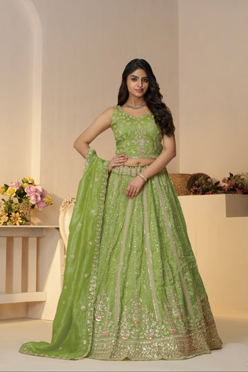 Green Jimmy Choo bridal lehenga with heavy embroidery

