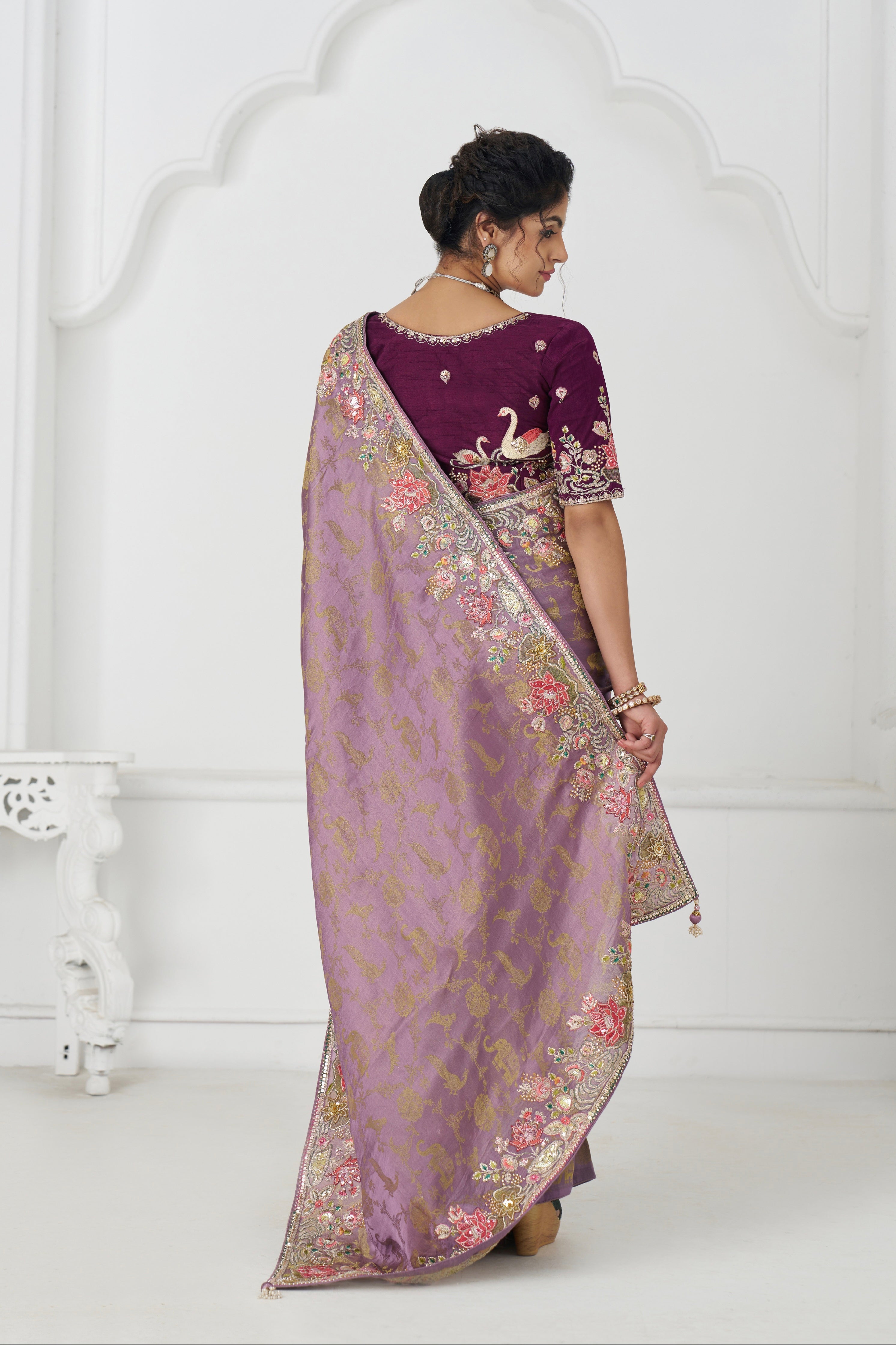 Elegant mauve party wear saree with handcrafted details