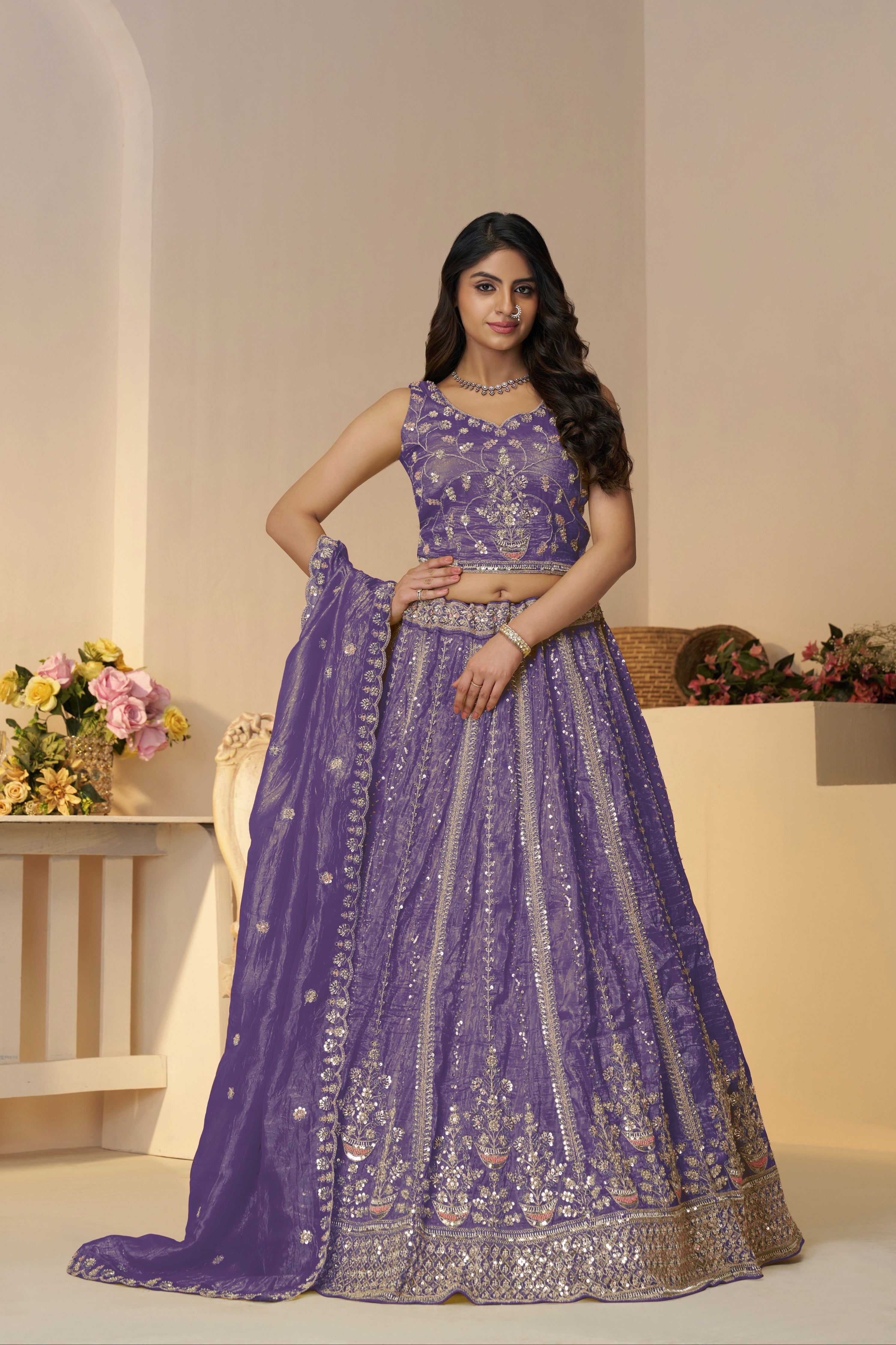 Purple Jimmy Choo bridal lehenga with heavy zari embroidery