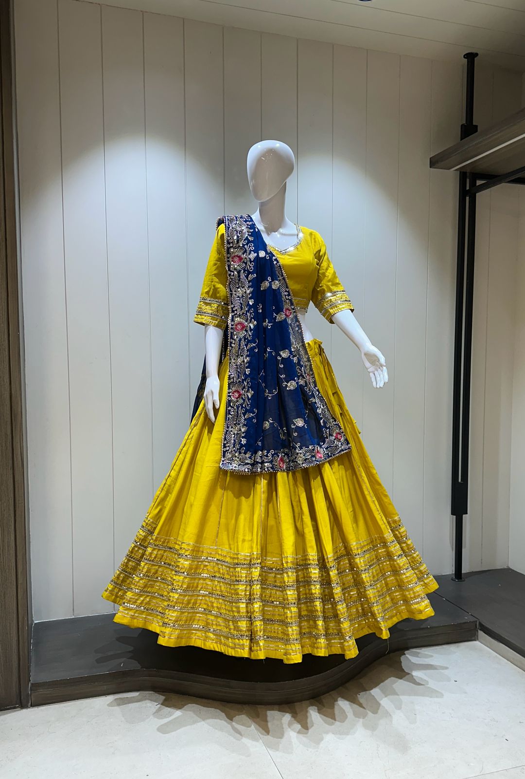 Yellow chaniya choli with blue dupatta

