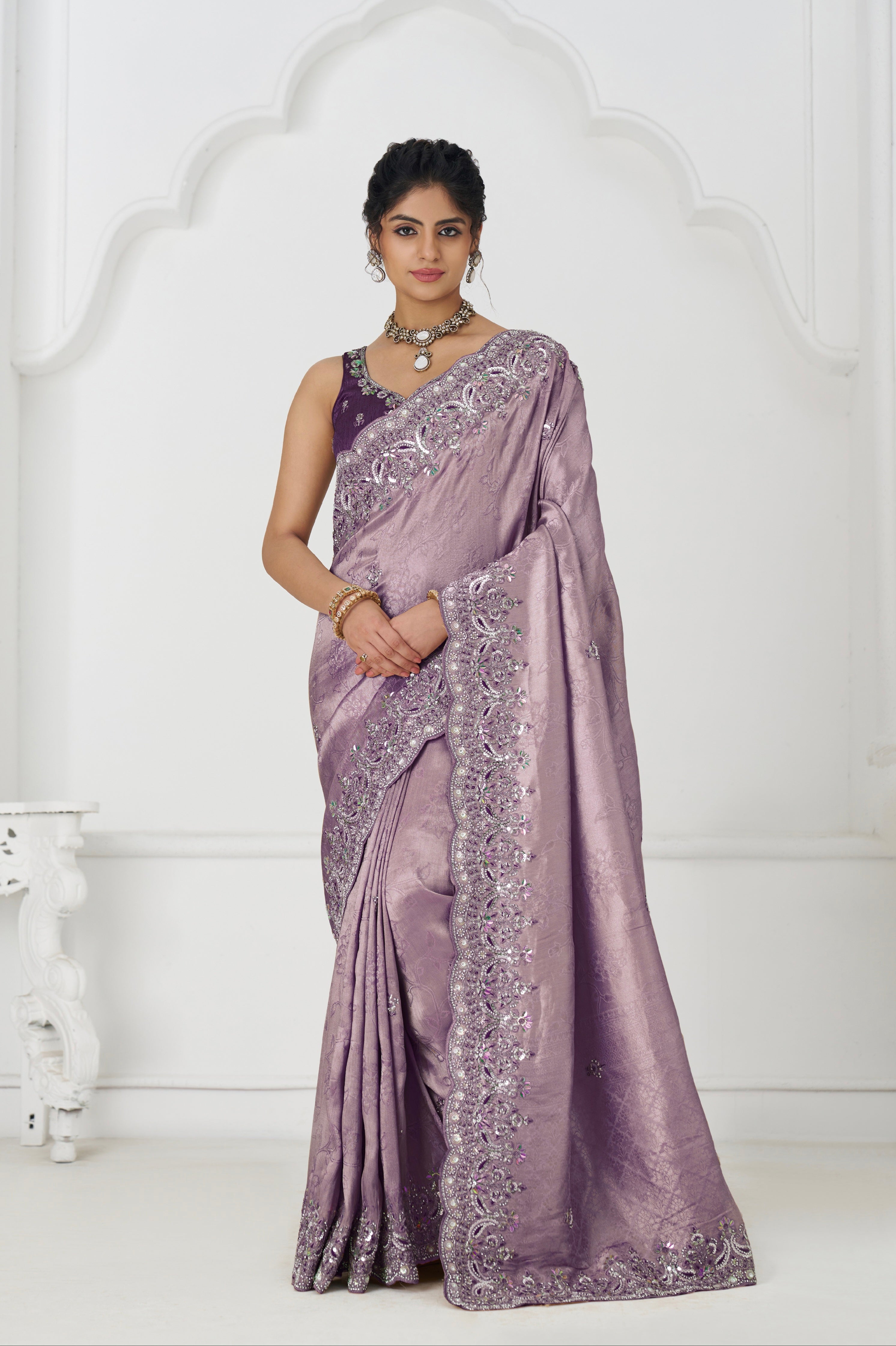 Elegant embroidered mauve silk saree with matching blouse