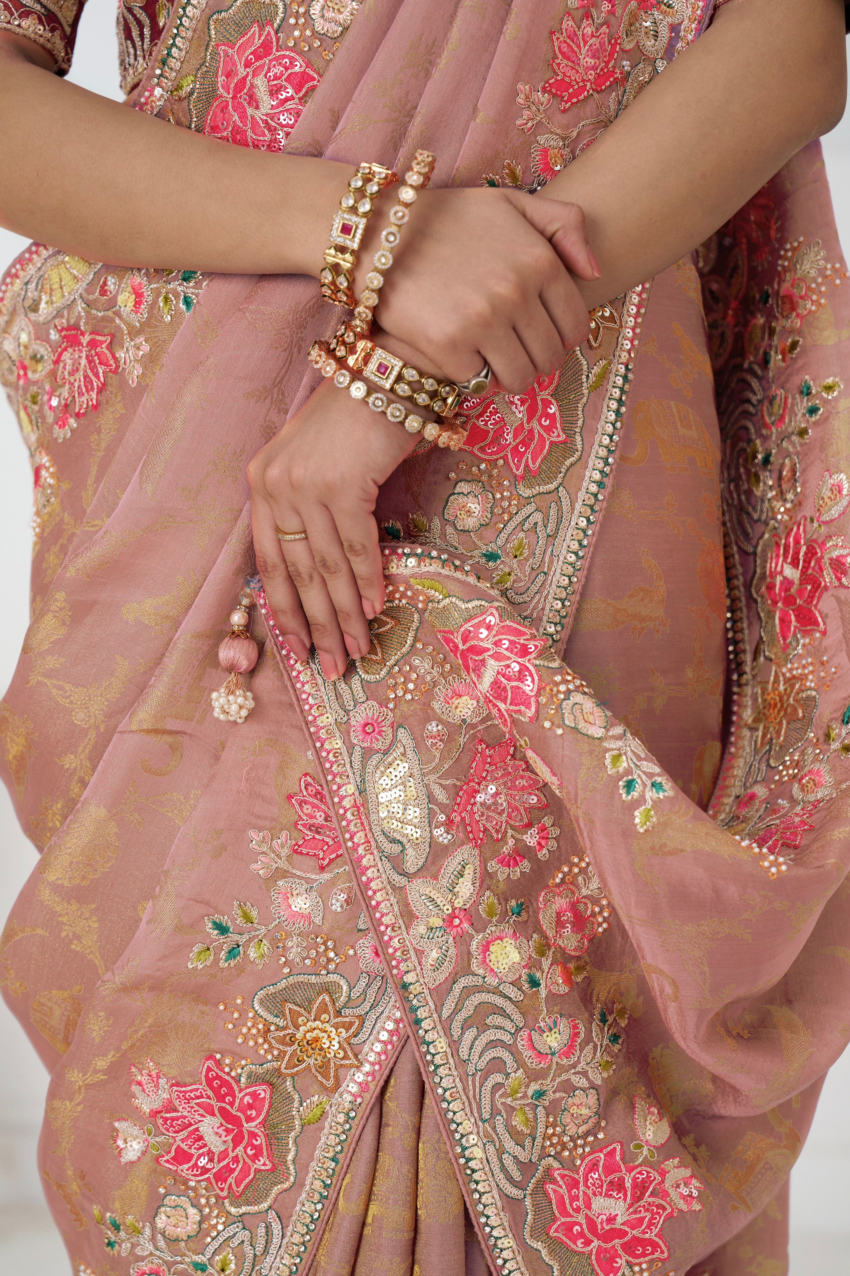 Elegant peach silk saree with paisley motifs