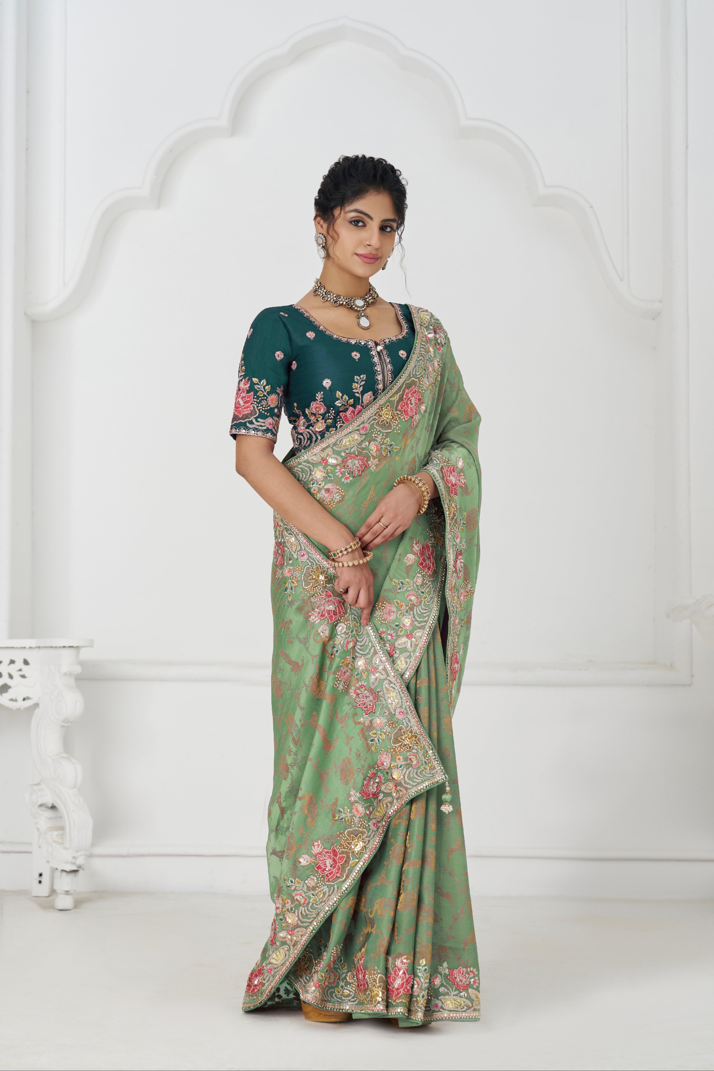 Elegant green Dola saree for wedding and reception