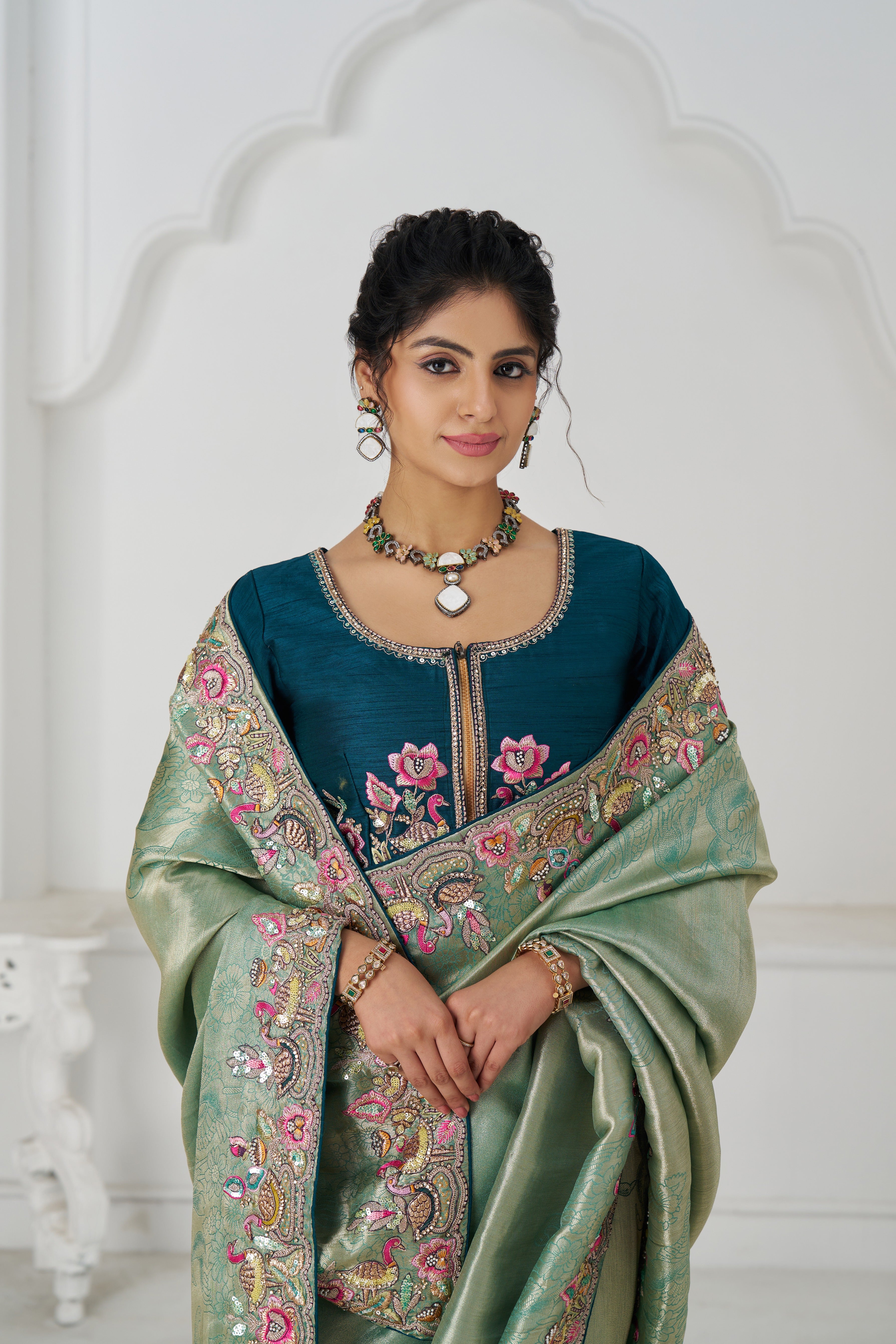 Designer green silk saree with embroidery for wedding