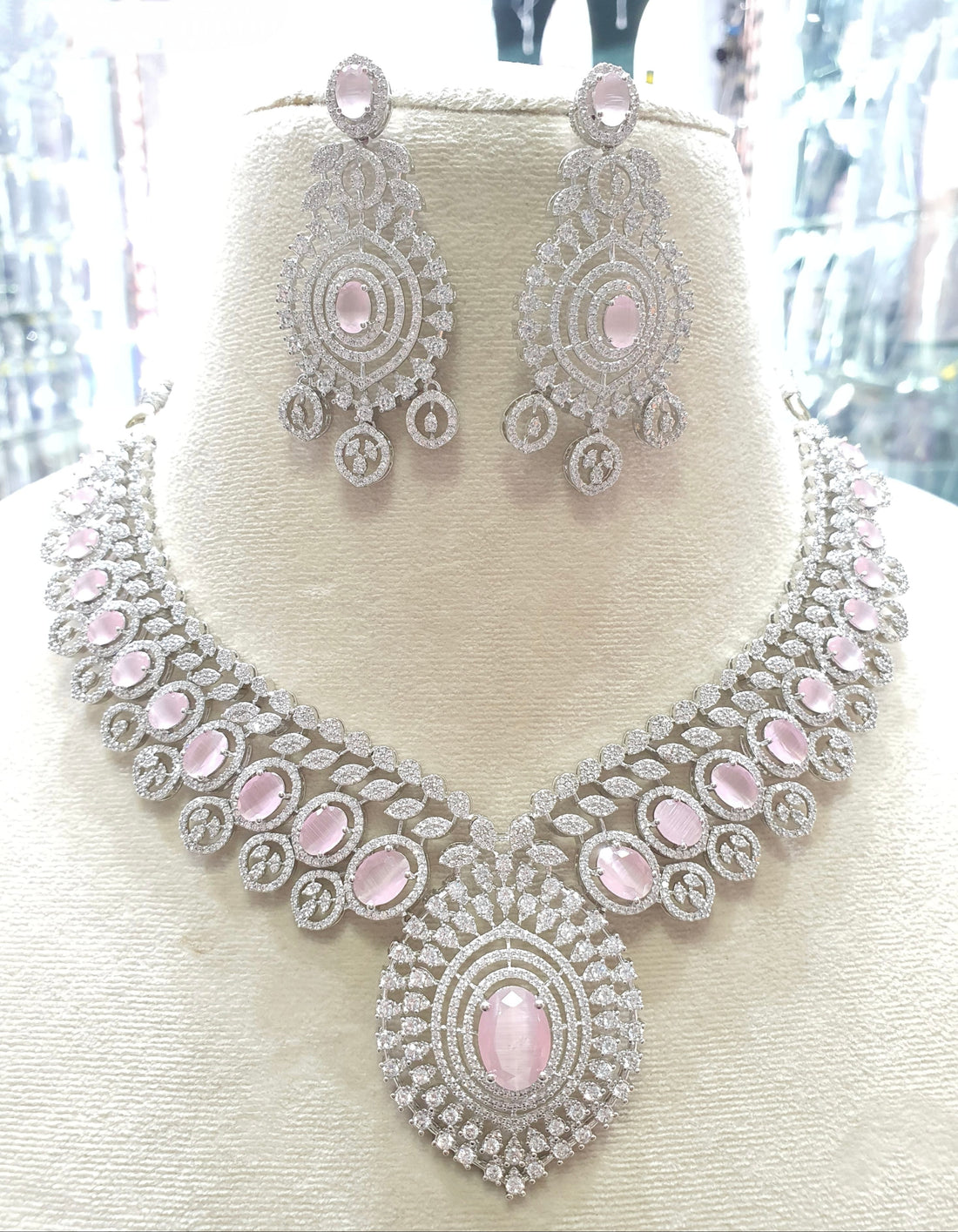 Silver necklace with pink stones
