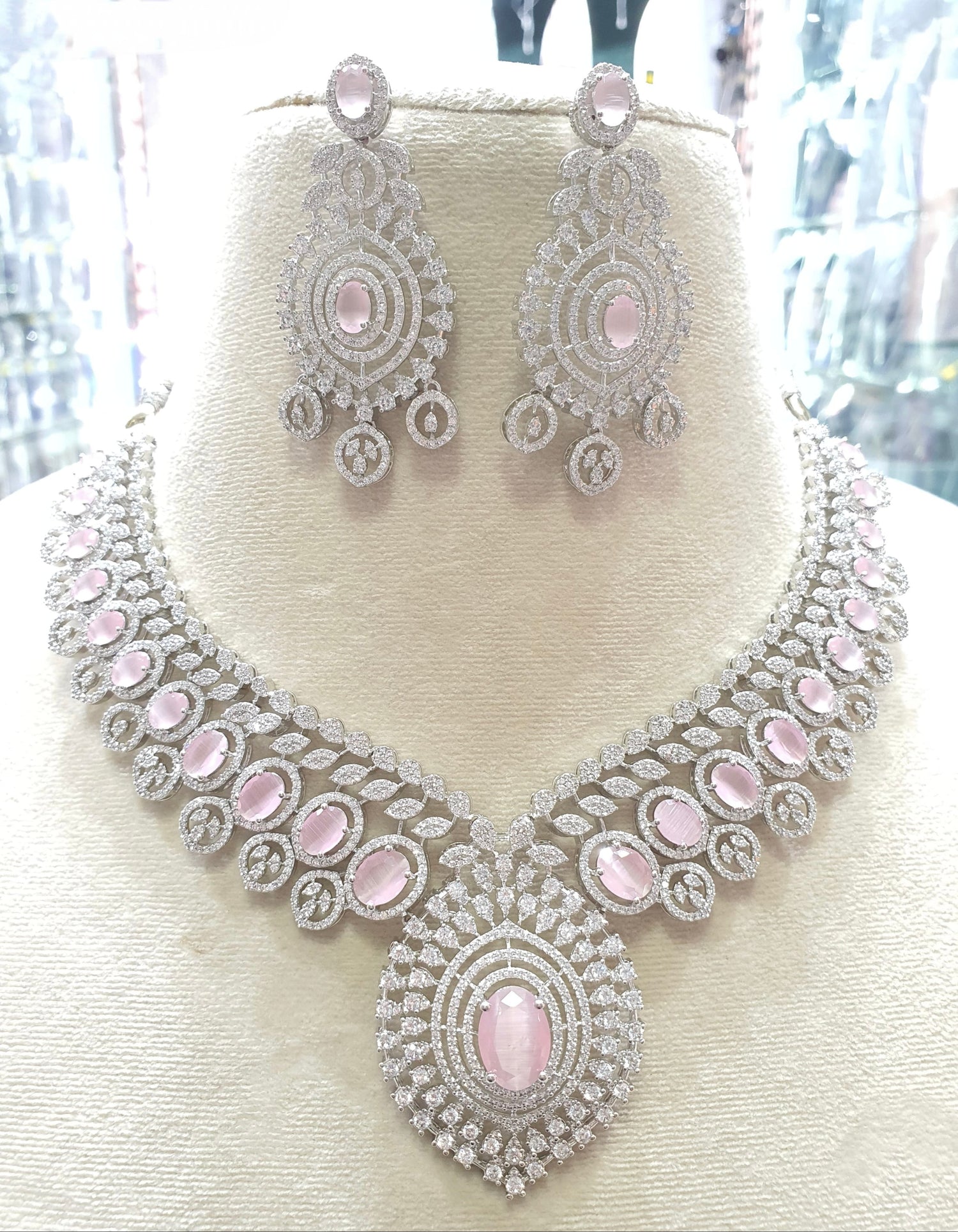 Silver necklace with pink stones