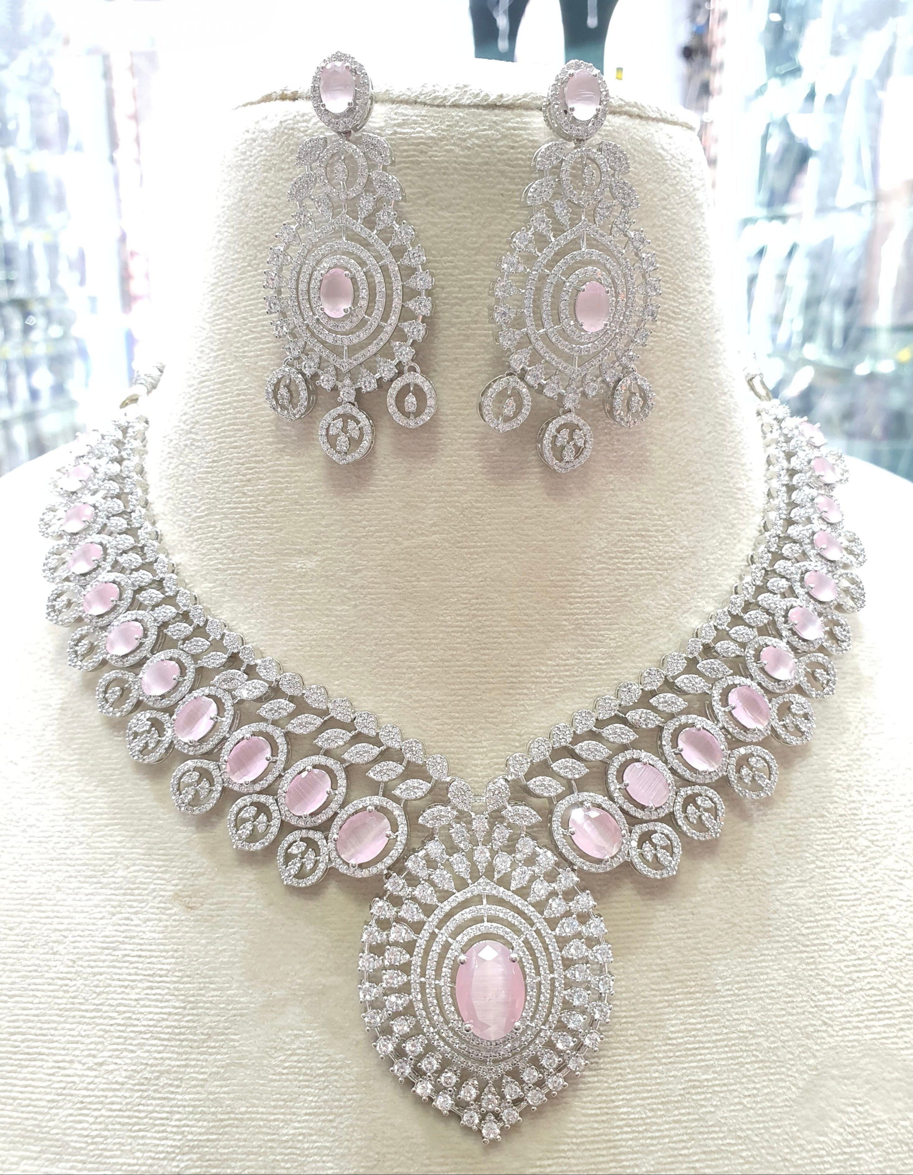 Silver necklace with pink stones