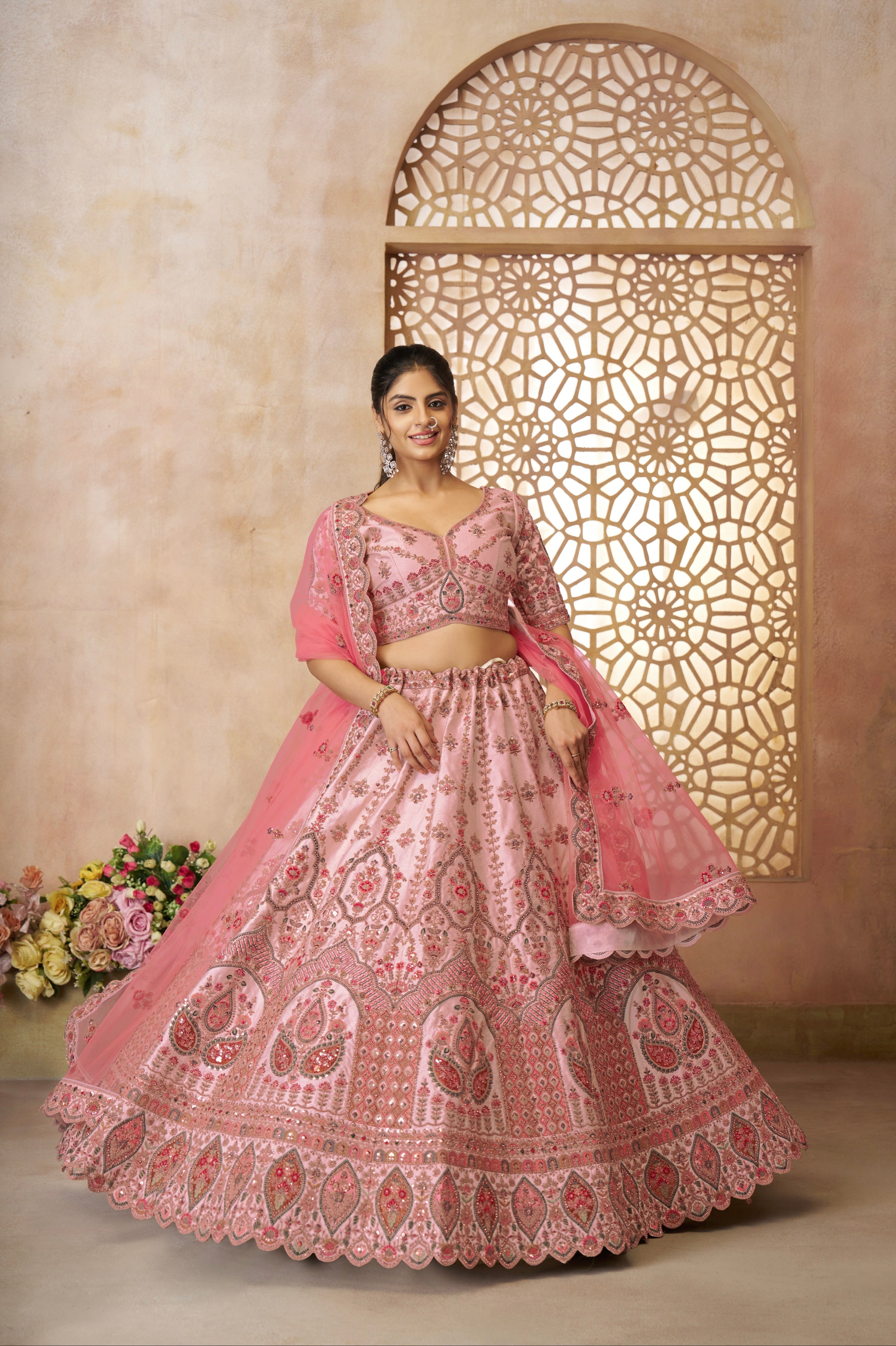 Indian bridal lehenga in pastel pink silk