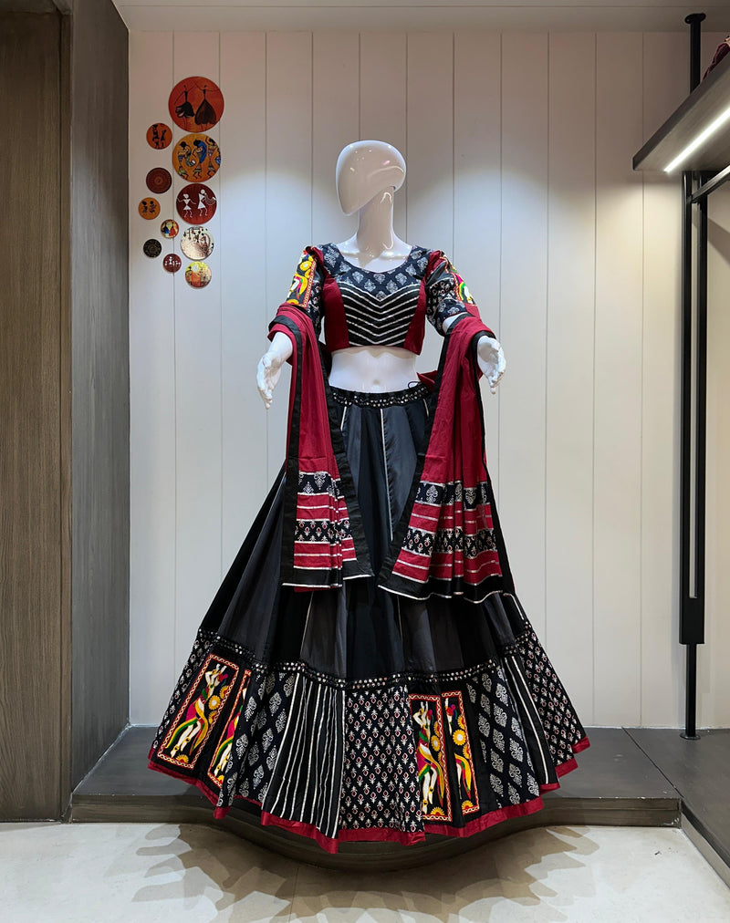 Black gamthi patch chaniya choli for navratri with tribal artwork