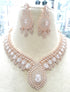 Rose gold necklace with clear stones and earrings
