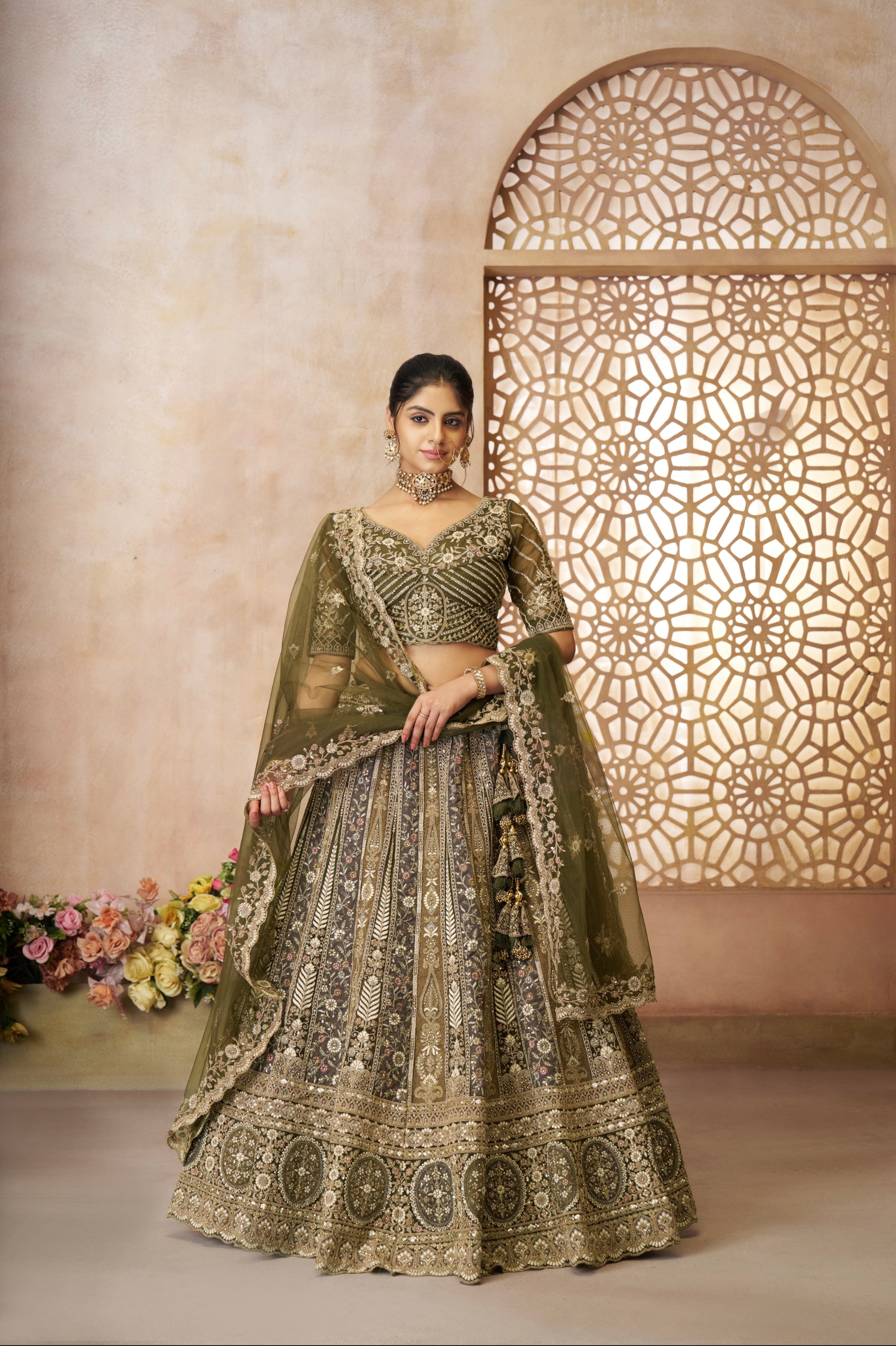 Mehendi green designer bridal lehenga set with intricate zari and sequin work