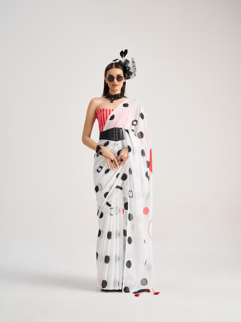 Contemporary georgette saree with bold black polka dots