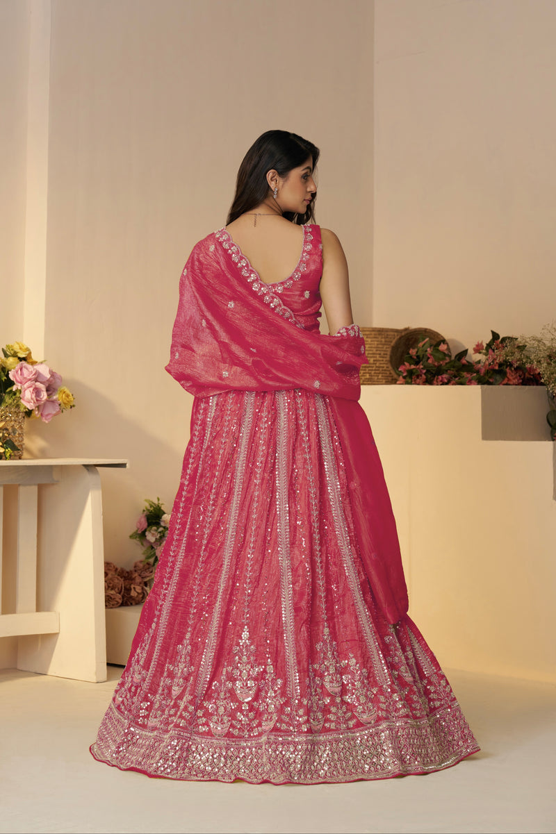 Back view of pink Jimmy Choo designer bridal lehenga with dupatta

