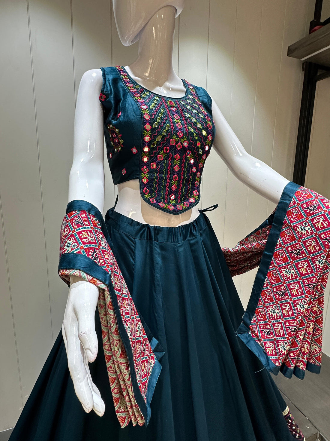 Teal blue handwork lehenga with Patola dupatta