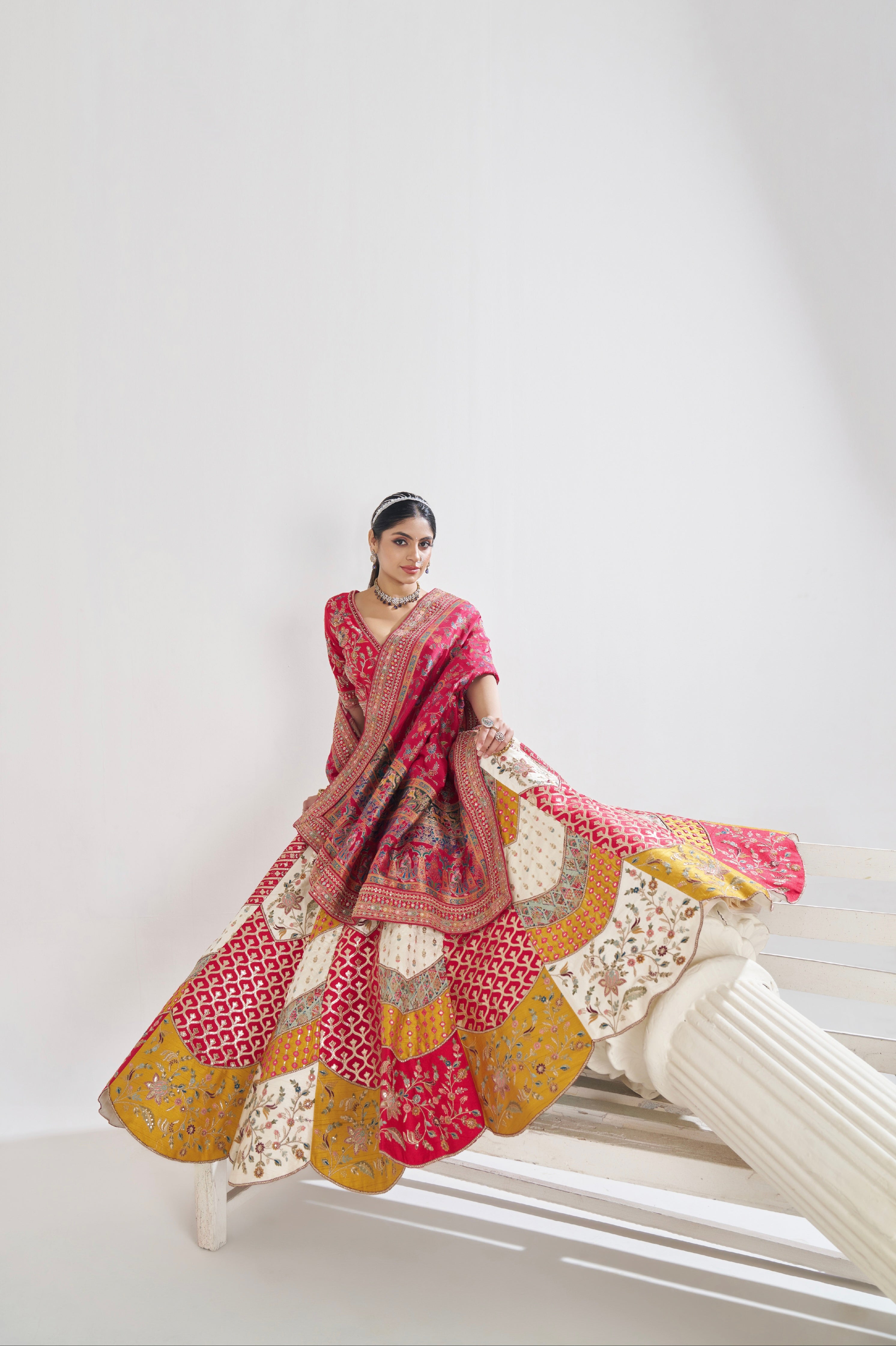 White Banarasi silk bridal lehenga with red dupatta
