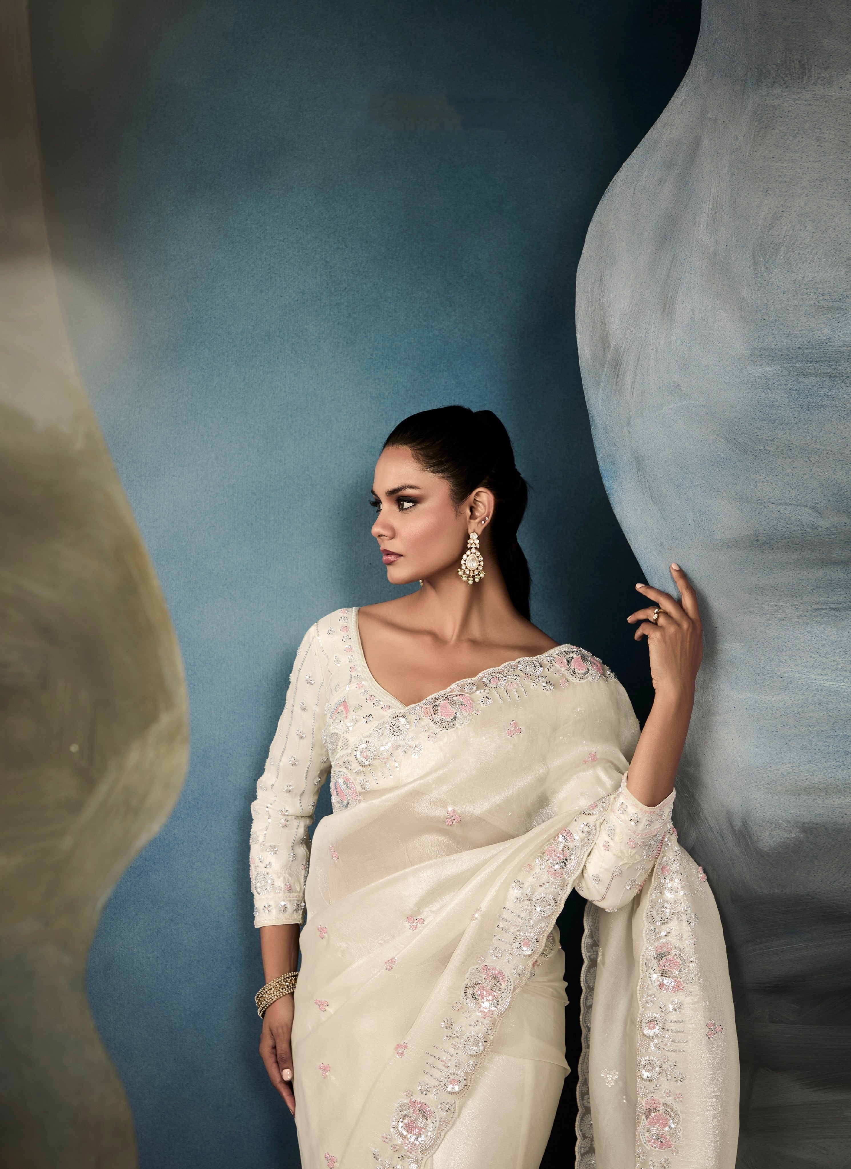 Tissue fabric off-white saree with satin handwork blouse

