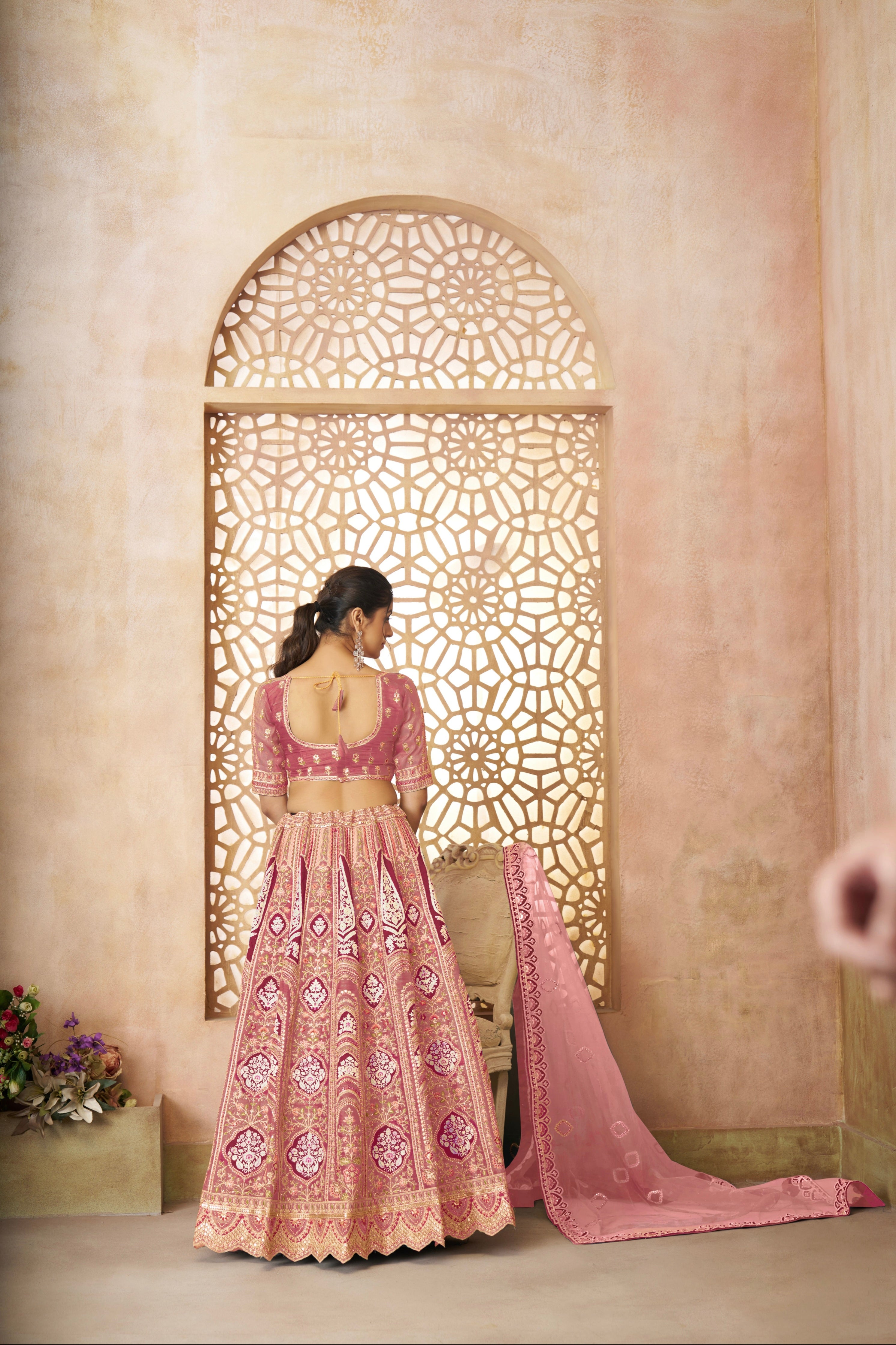 Pink aari embroidery lehenga for festive occasions