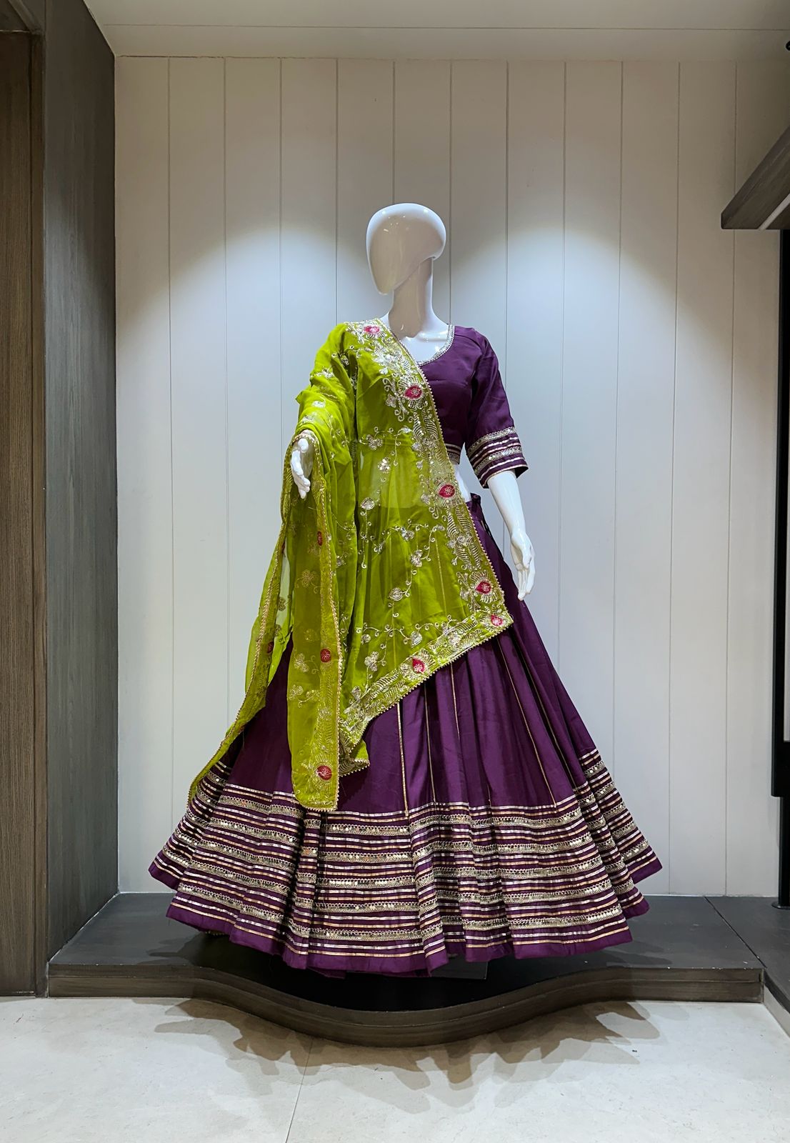 Purple chaniya choli with green dupatta

