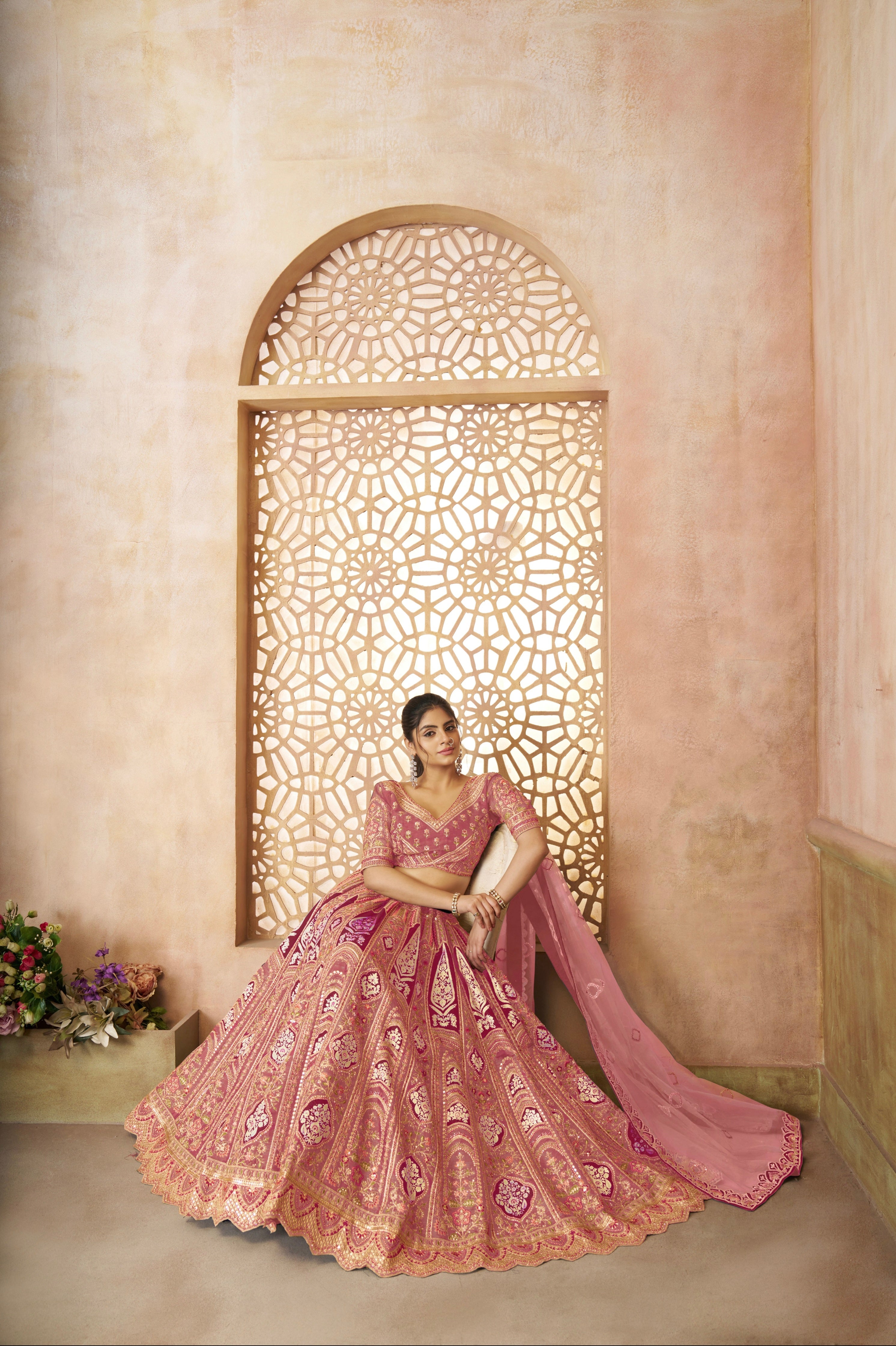 Pink bridal lehenga with floral embroidery and banarasi patch