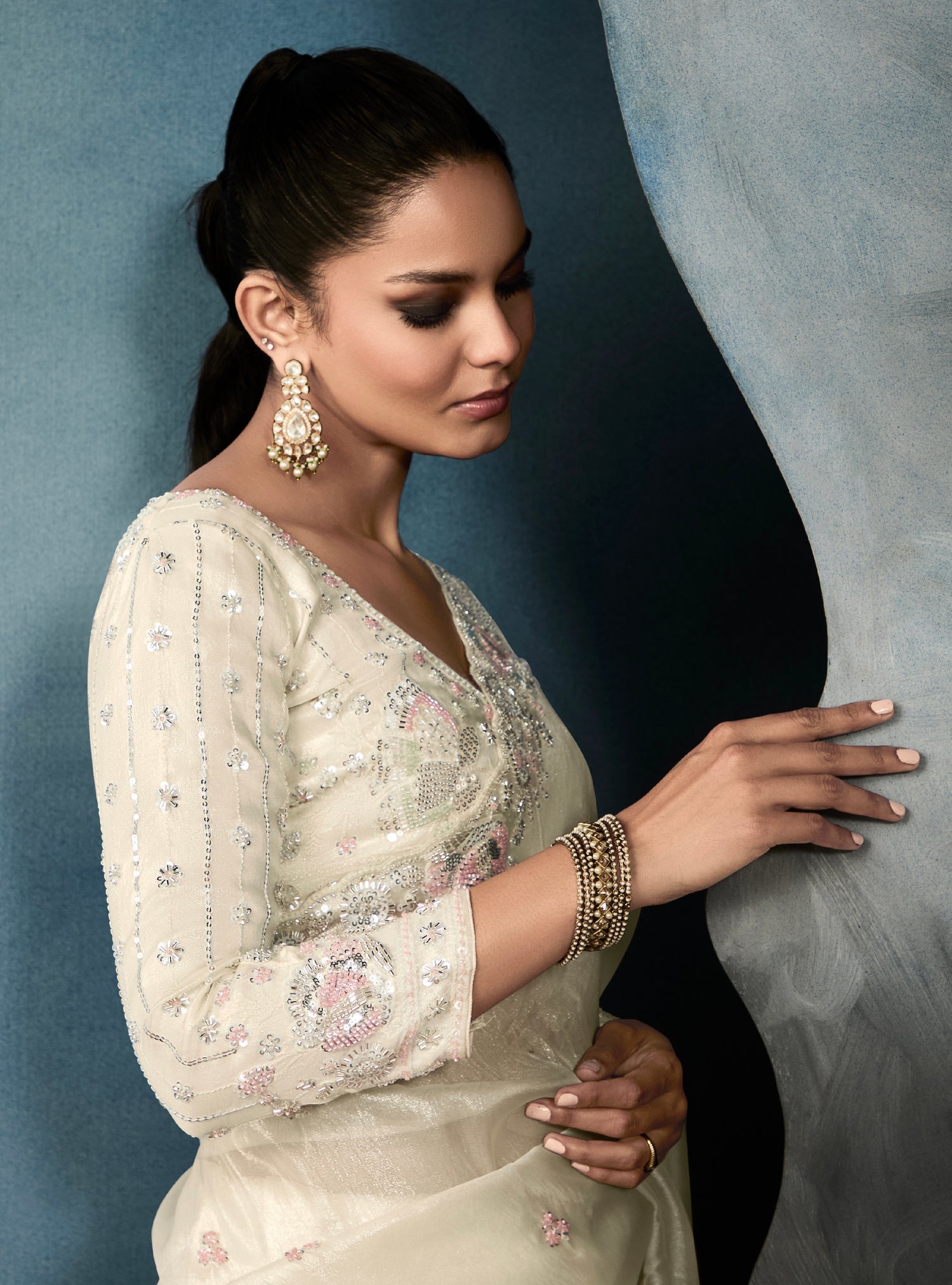 Bridal off-white tissue saree with embroidery

