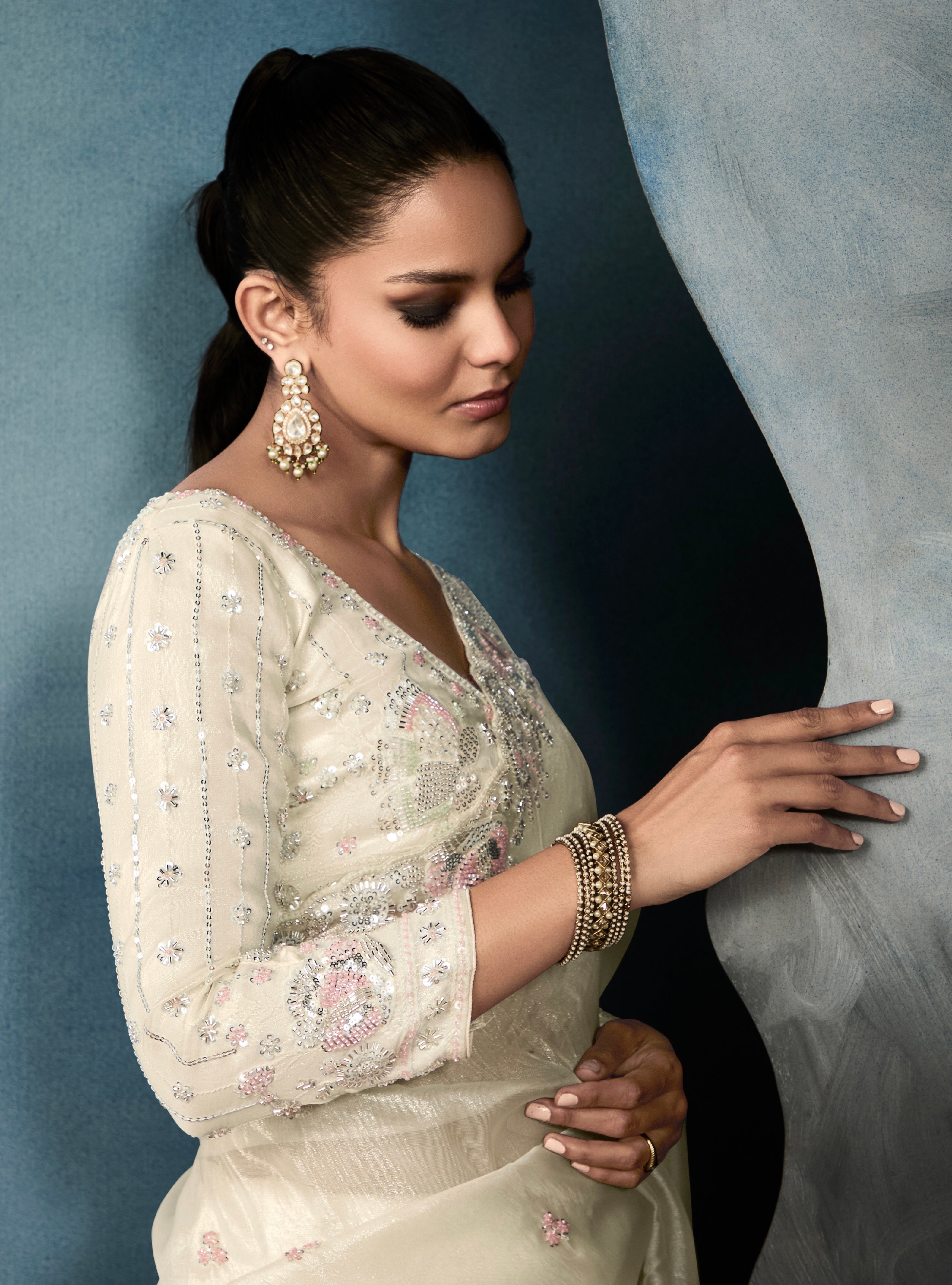 Bridal off-white tissue saree with embroidery

