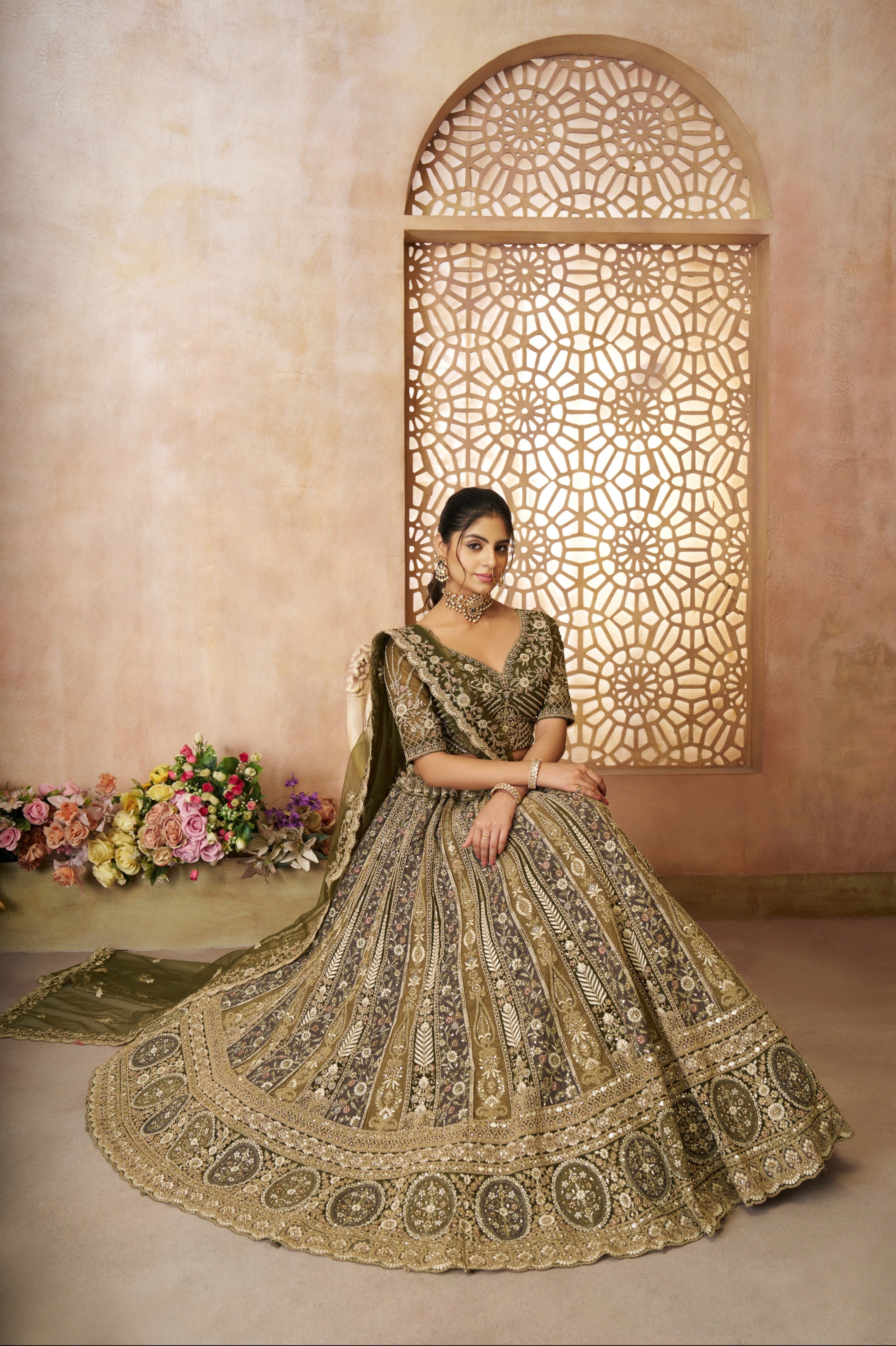 Traditional Indian mehendi green bridal lehenga choli with handcrafted details