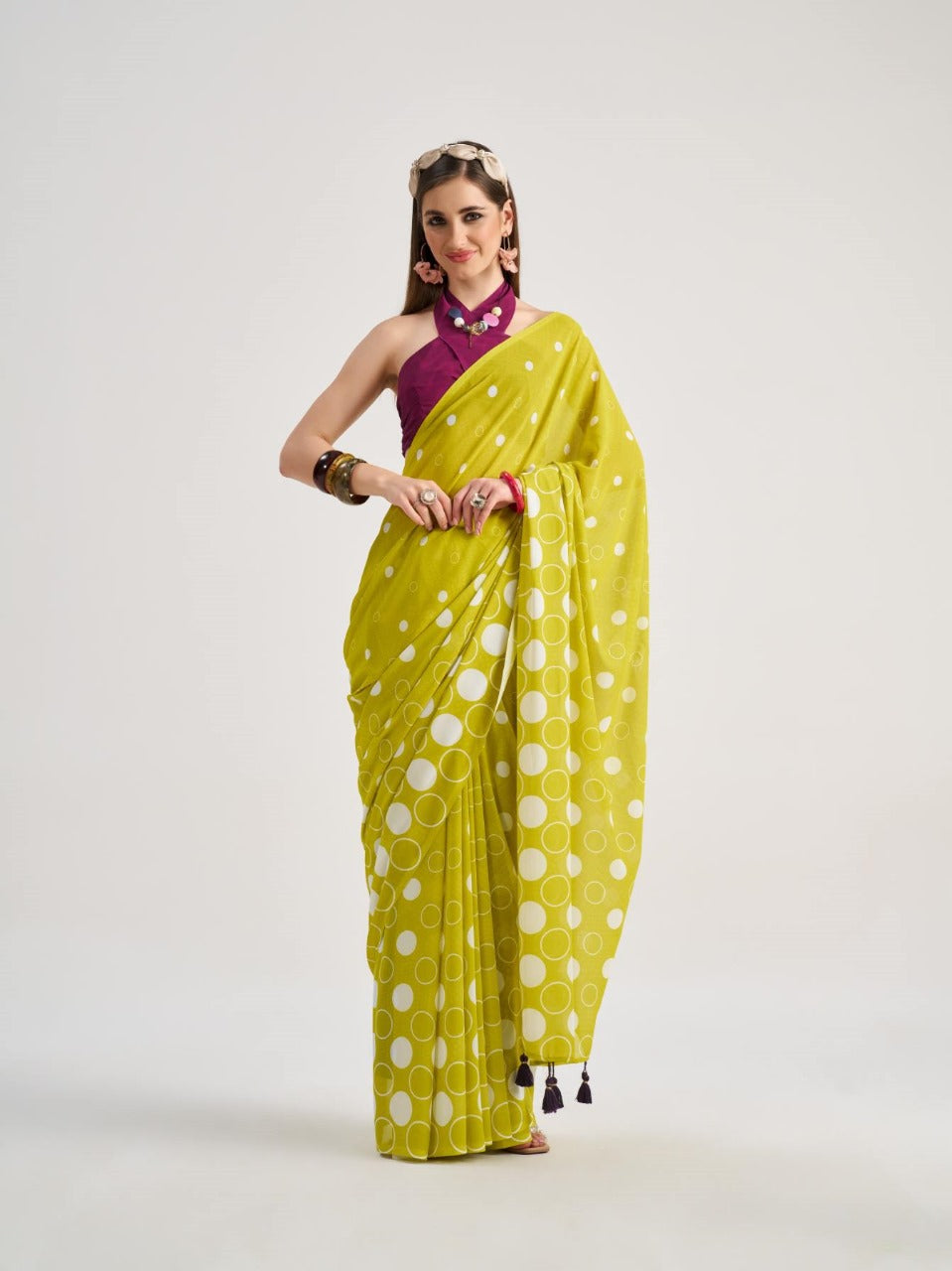 Lime green georgette saree with white dots

