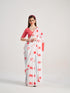 White georgette saree with red polka dots for party wear