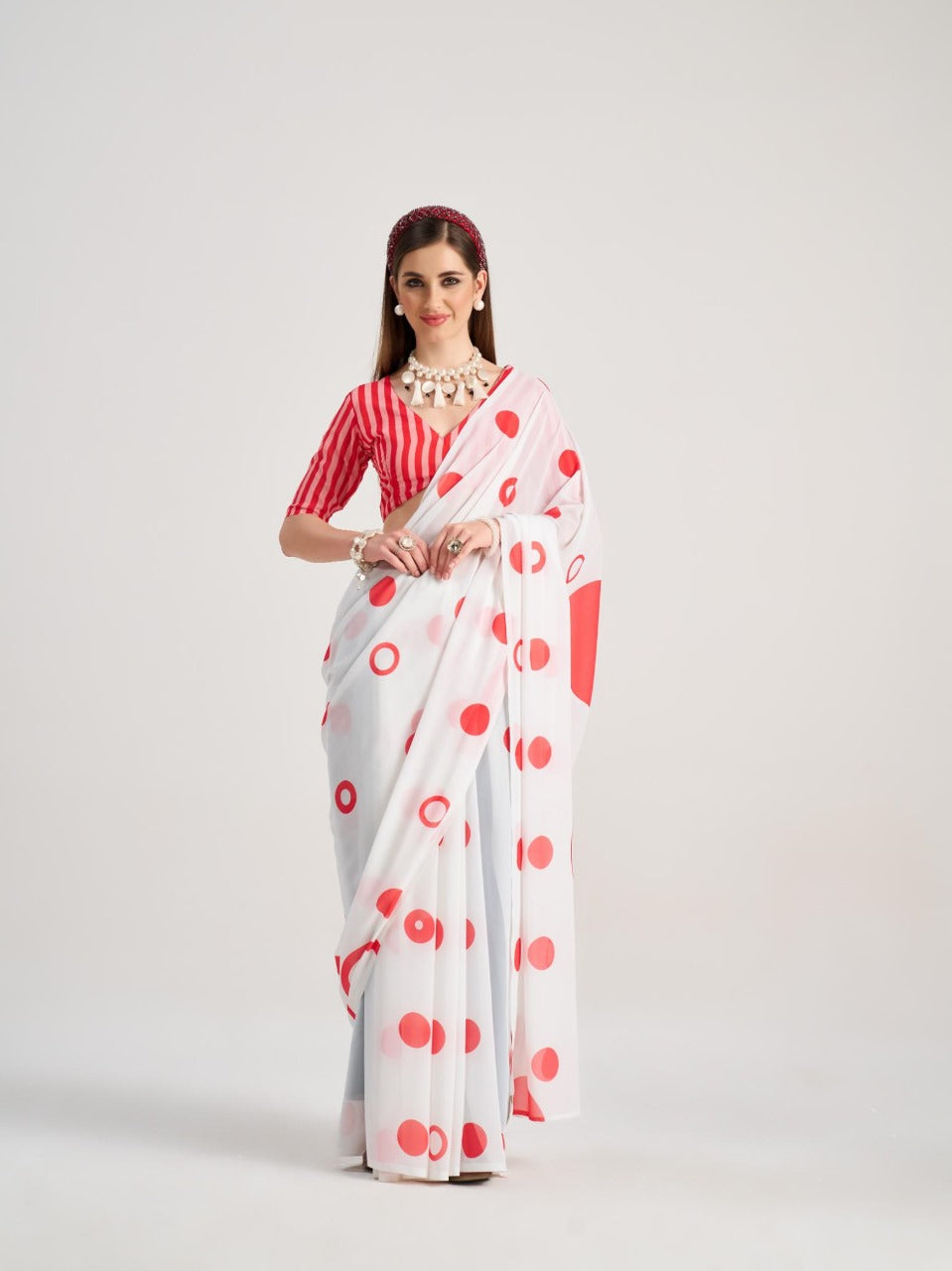 White georgette saree with red polka dots for party wear
