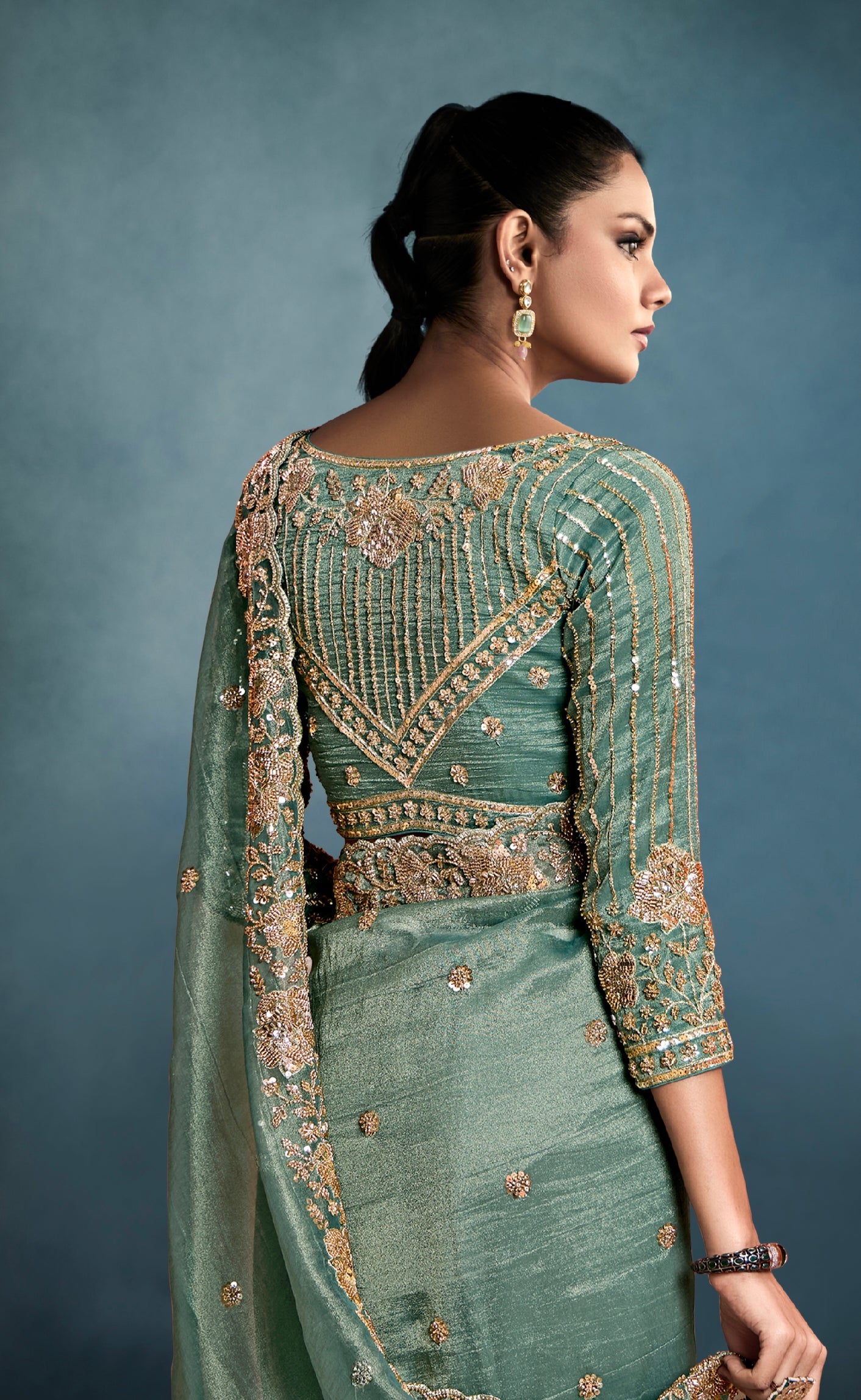 Festive wear sage green tissue saree for wedding