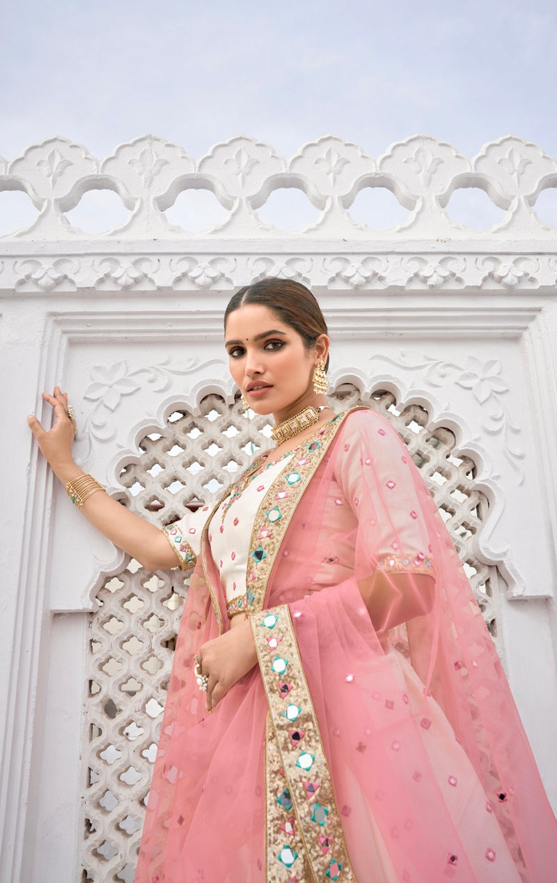 Designer bridal lehenga choli with colorful mirror detailing

