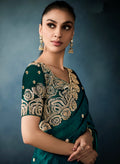 Festive wear bottle green tissue saree for weddings


