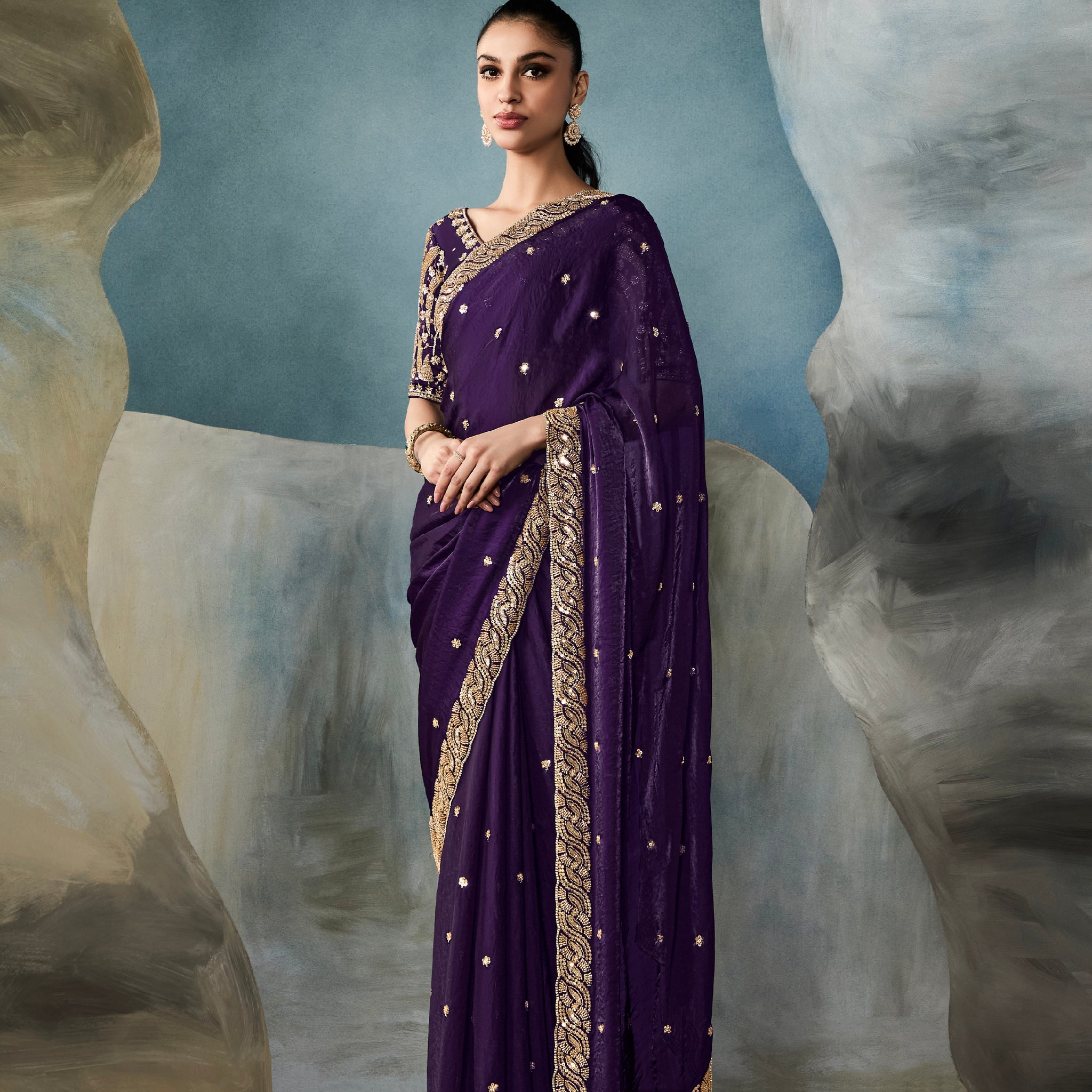 Royal purple tissue saree with designer hand embroidery

