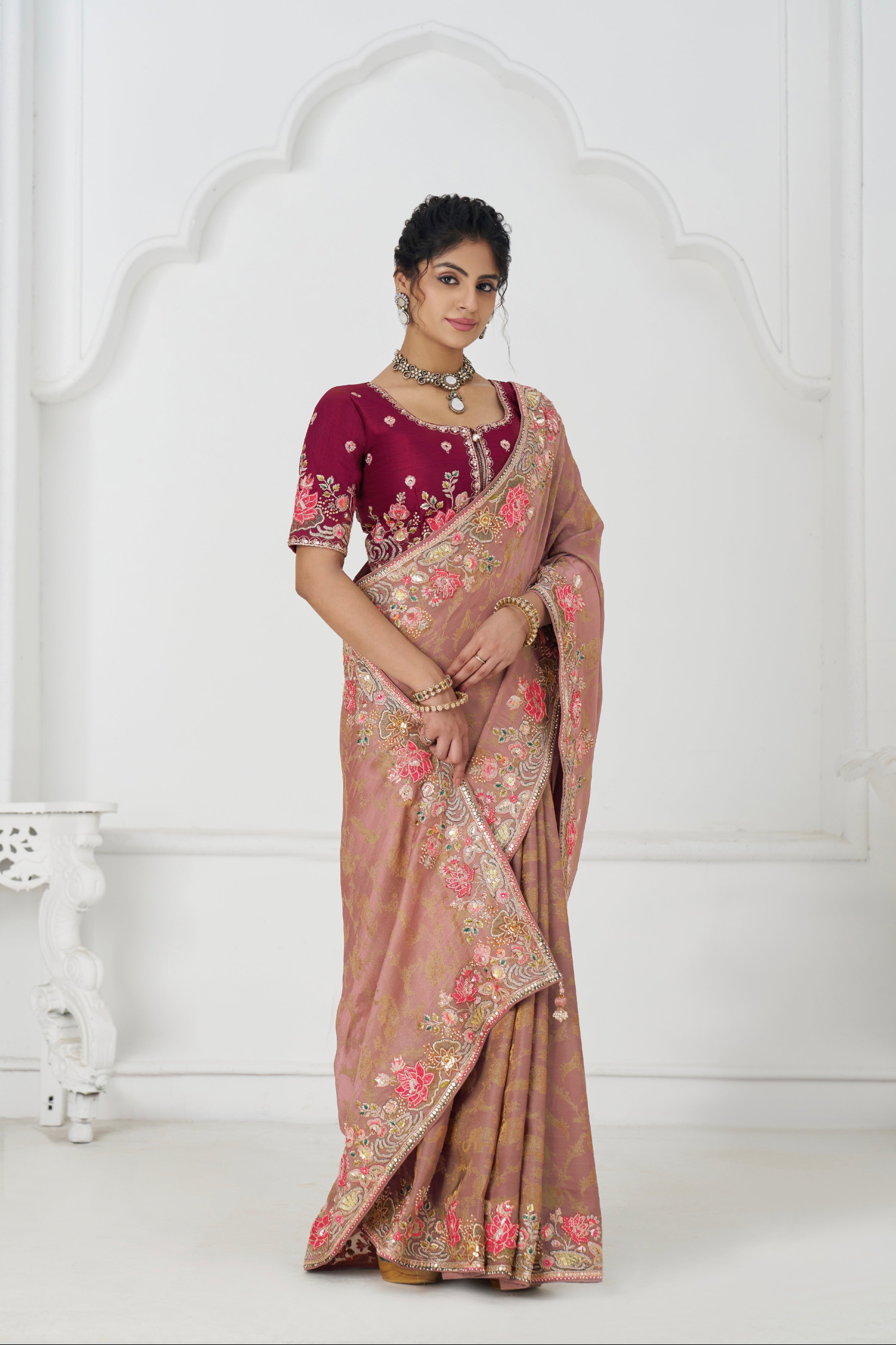 Peach saree with multicolor embroidery and unstitched blouse