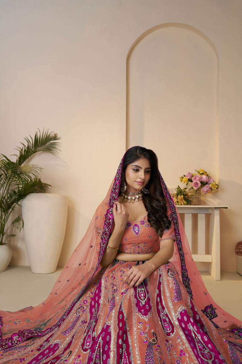 Traditional silk lehenga in vibrant orange shade
