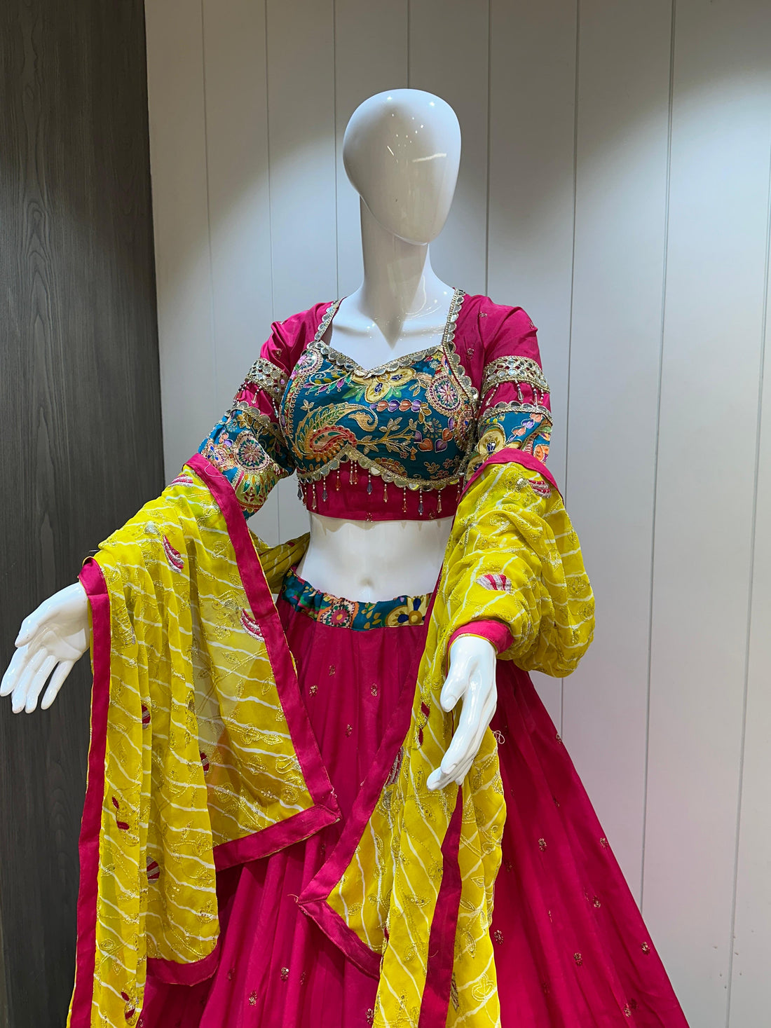 Hot pink chaniya choli with yellow dupatta


