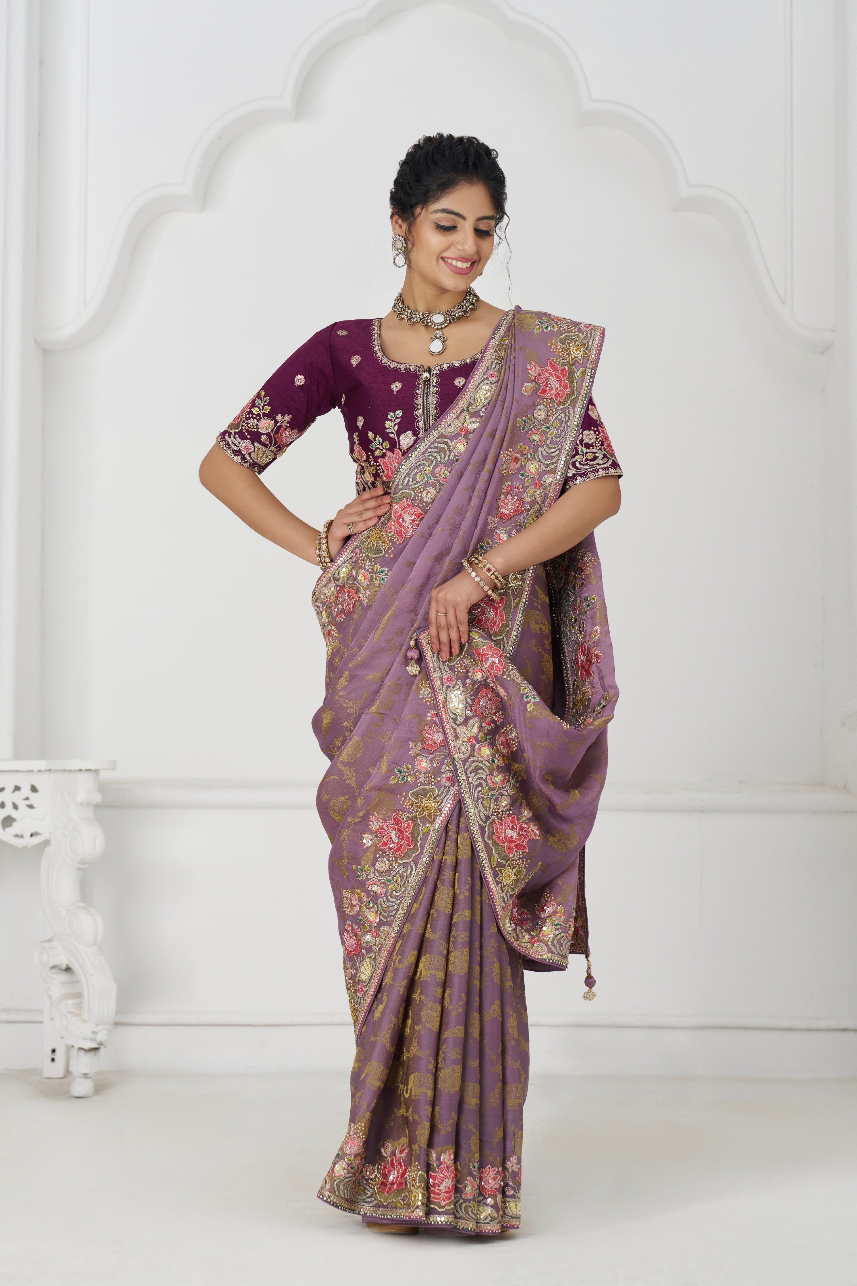 Mauve embroidered saree with sequins and beads