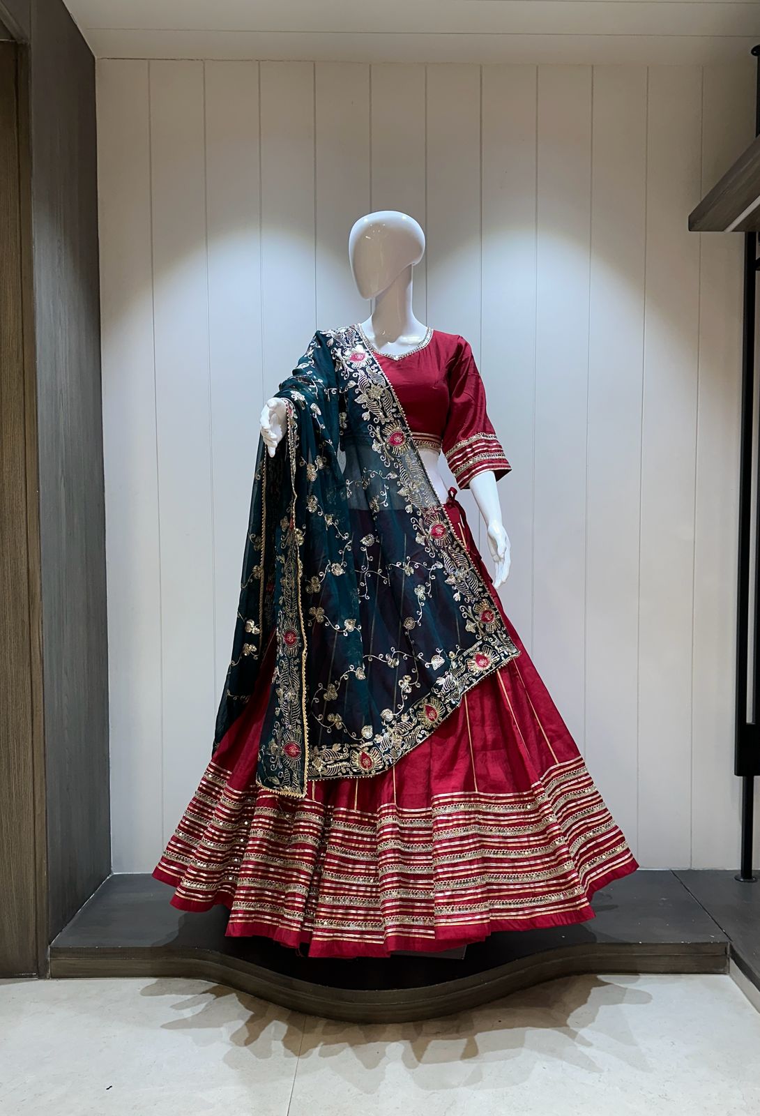 Wine red chaniya choli with bottle green dupatta

