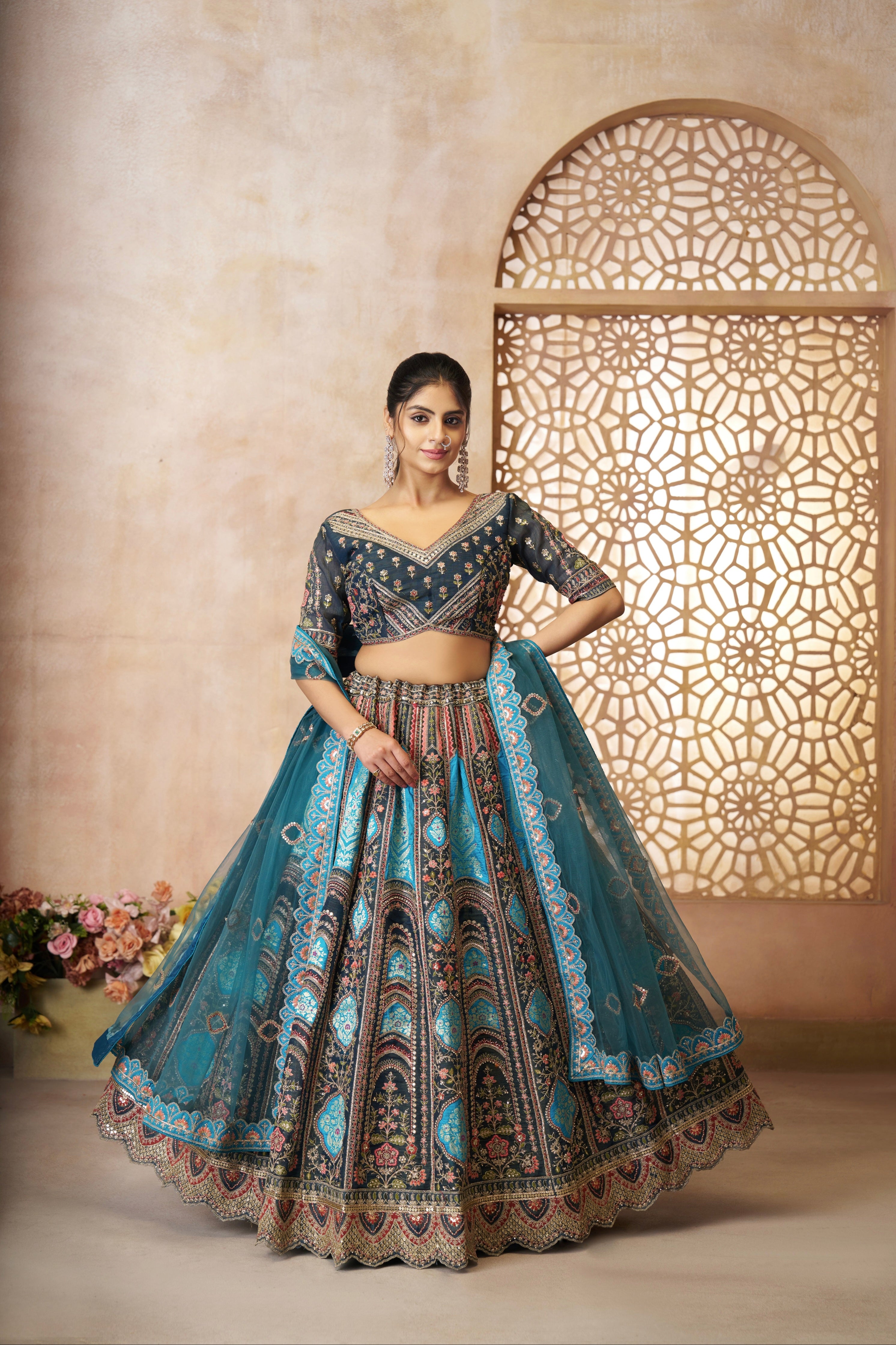 Blue Banarasi silk lehenga with aari embroidery
