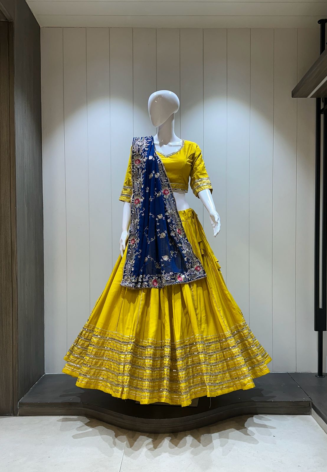 Yellow chaniya choli with blue dupatta

