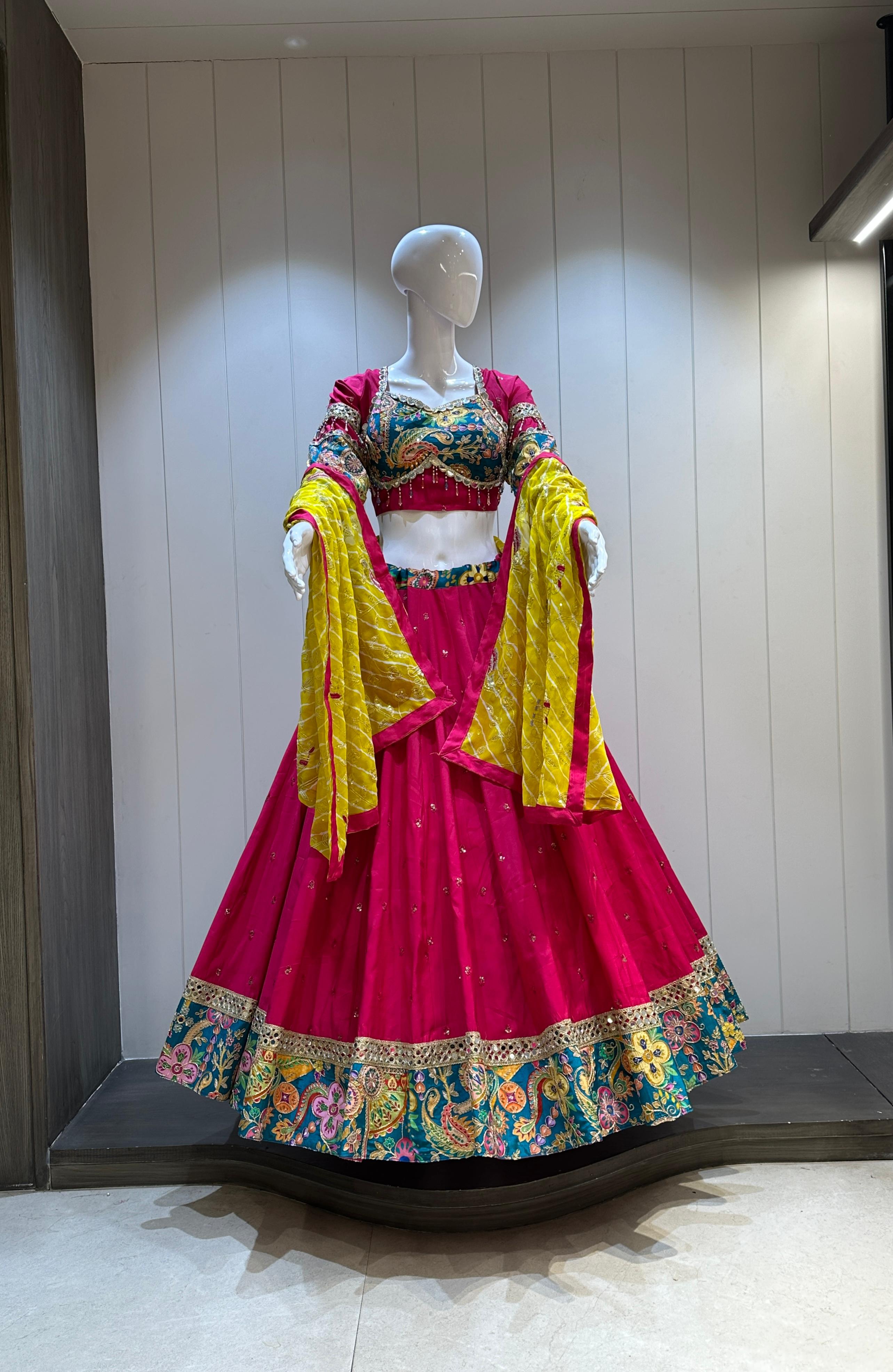 Hot pink chaniya choli with yellow dupatta

