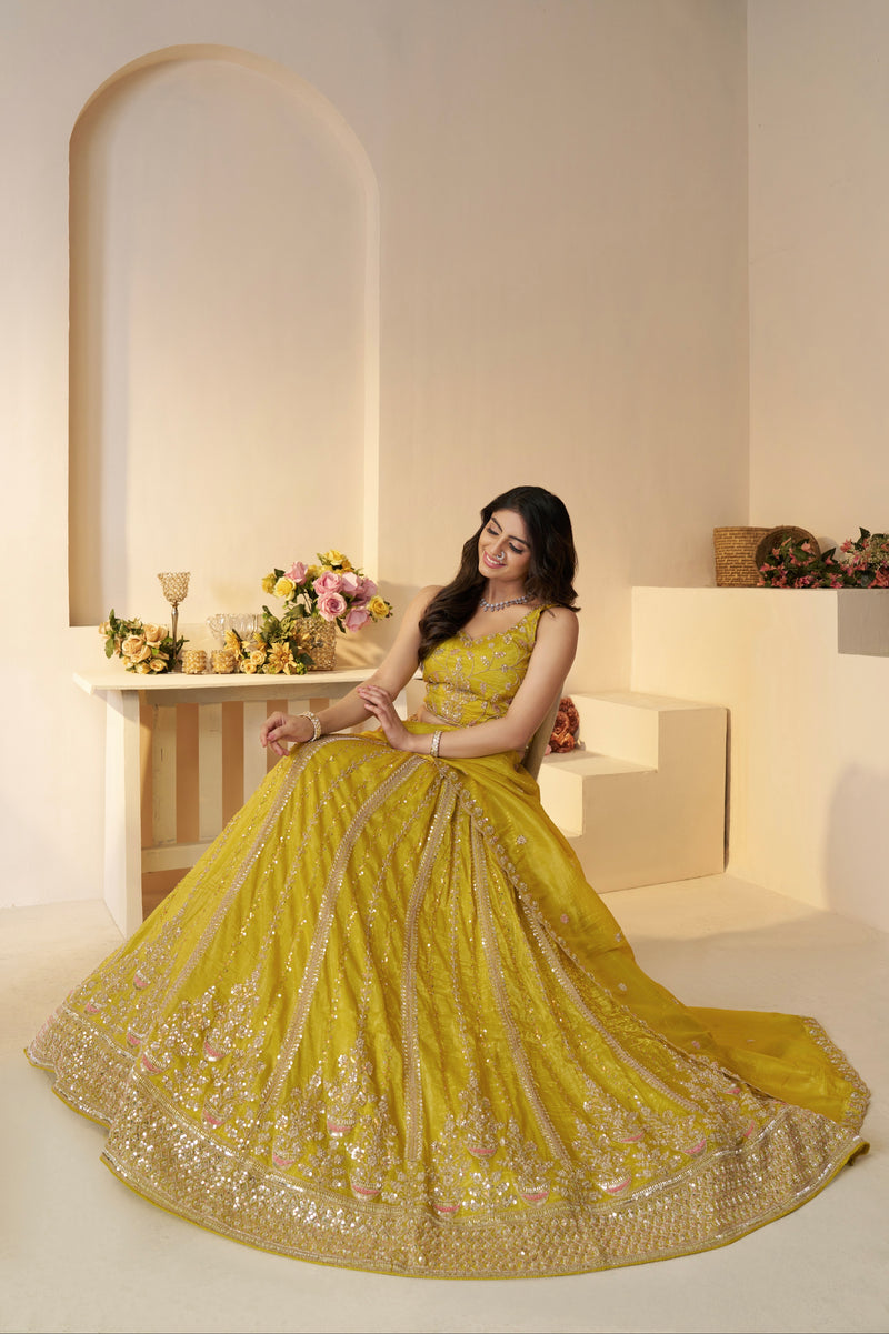 Designer yellow lehenga for wedding and haldi ceremony