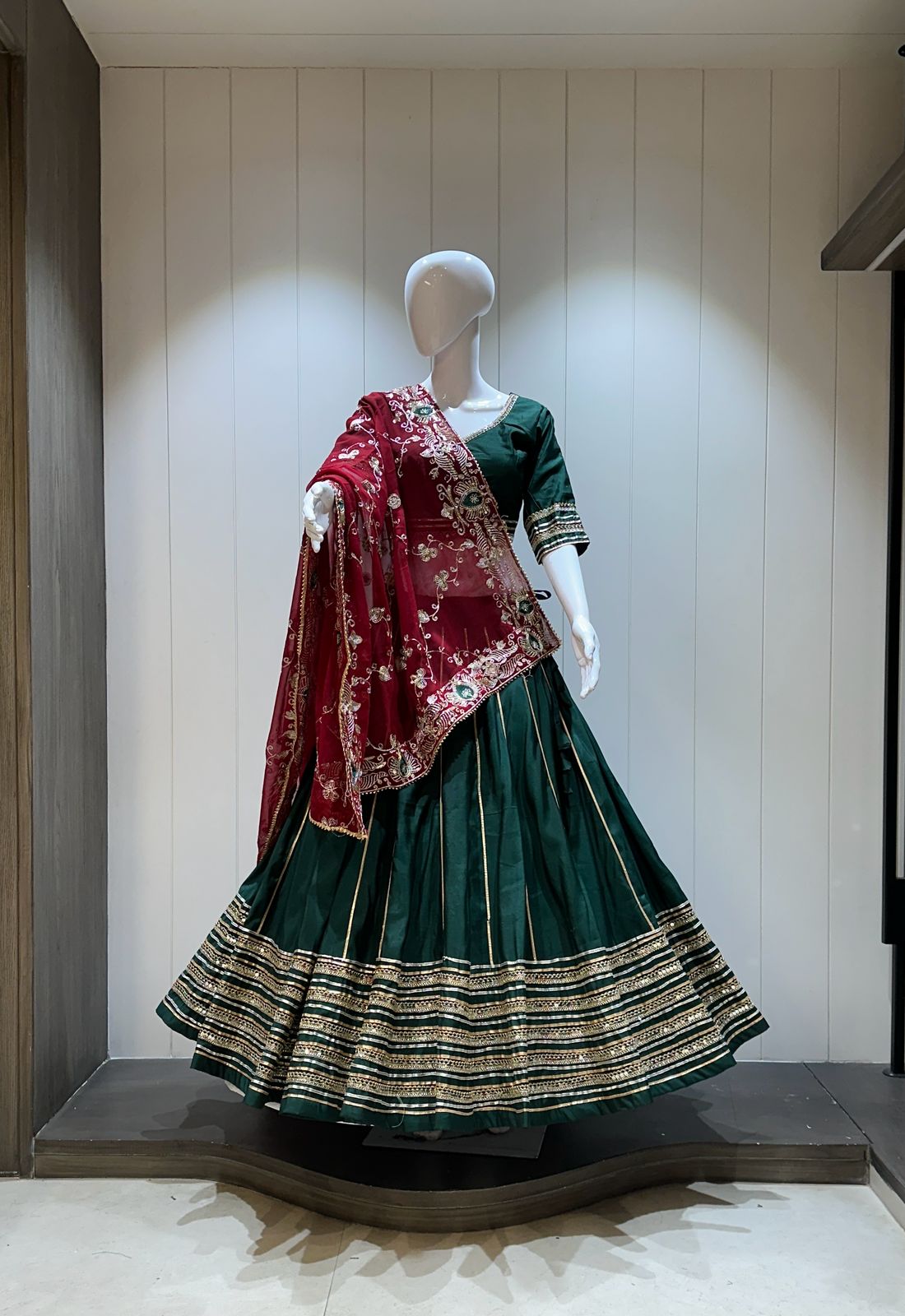 Green chaniya choli with red dupatta front view

