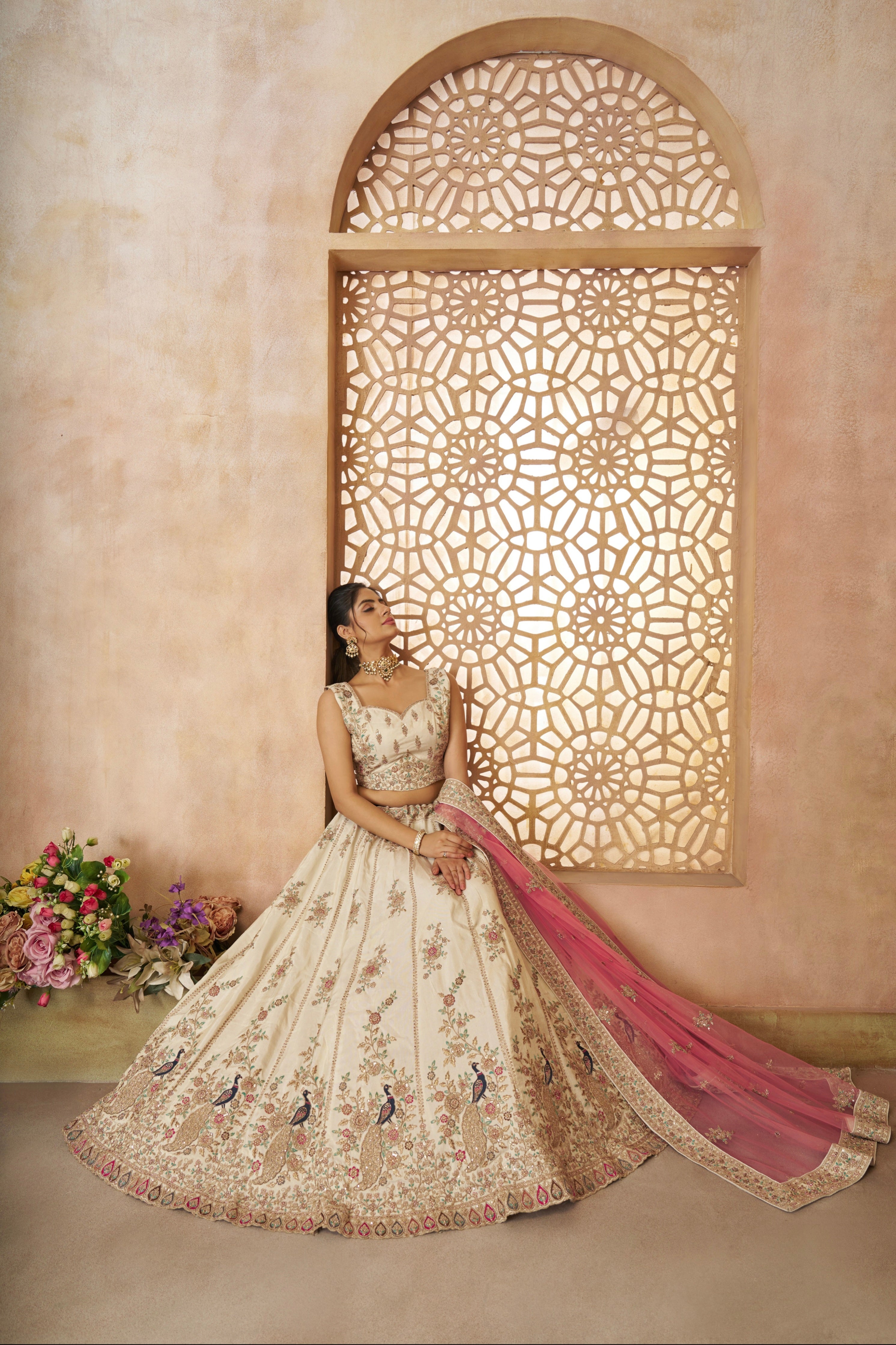 Designer white silk lehenga with pink dupatta, perfect for Indian bridal wear