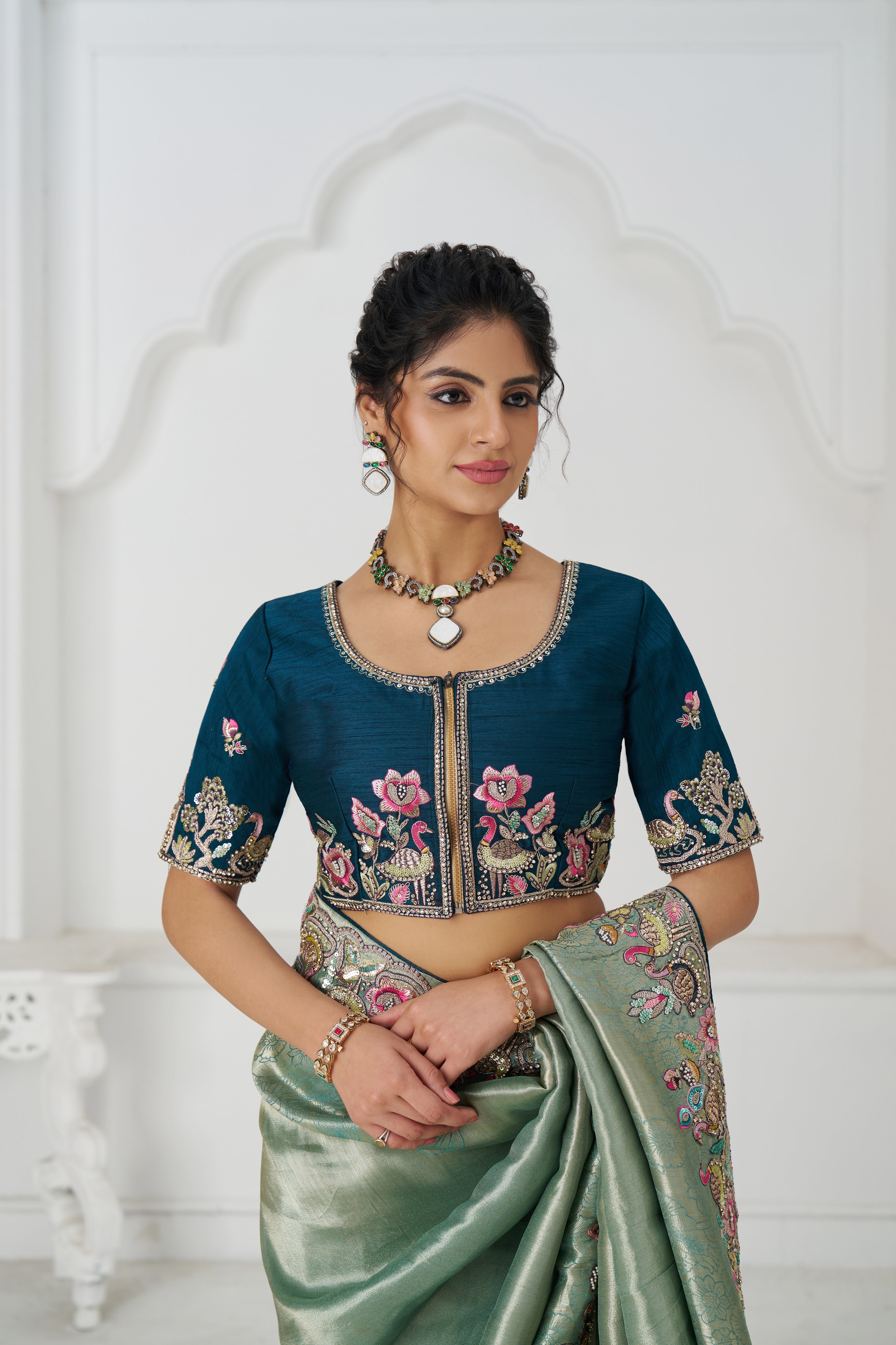Green viscose Dola silk saree with embellished border