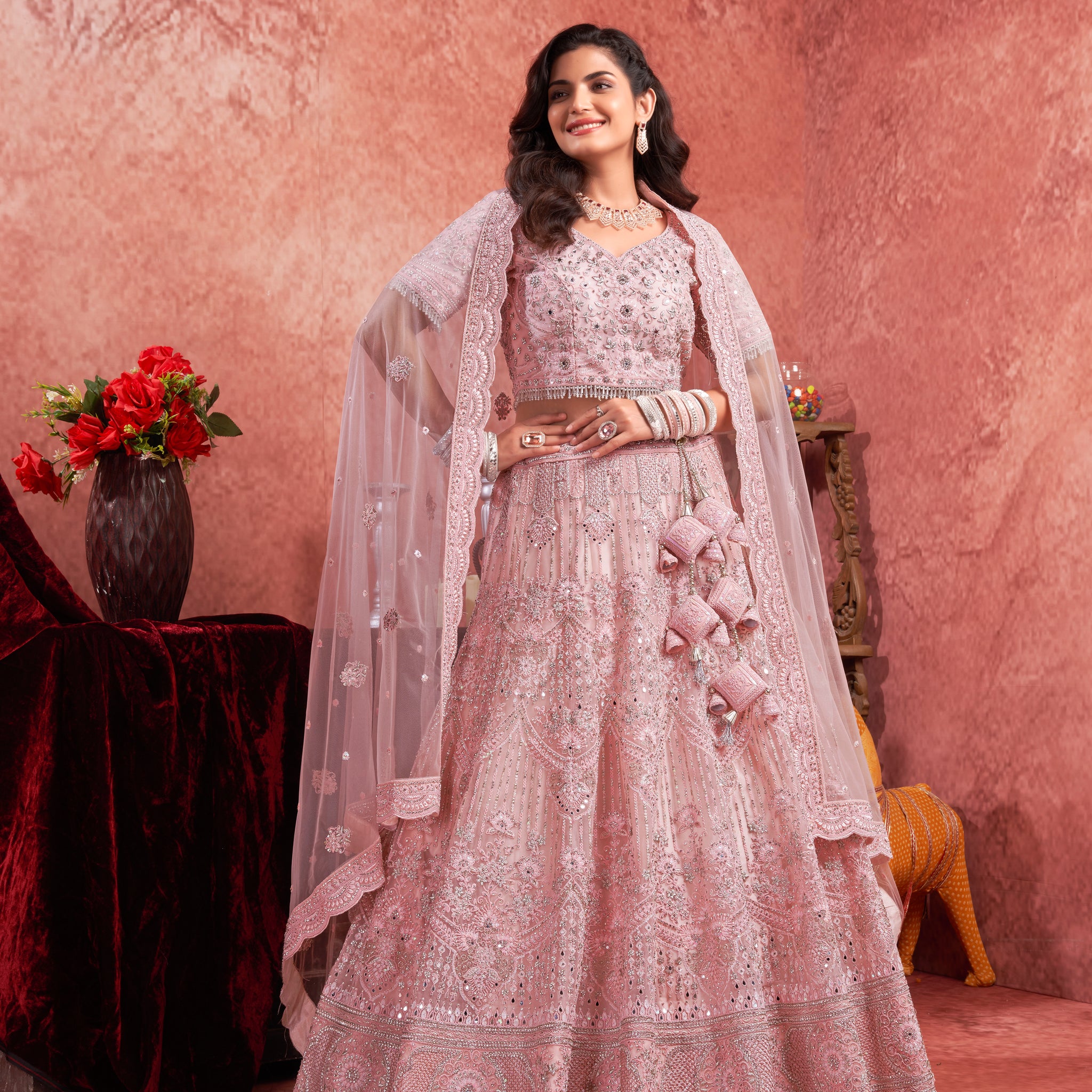 Pink Premium Net Bridal Lehenga with Handcrafted and Heavy Flair