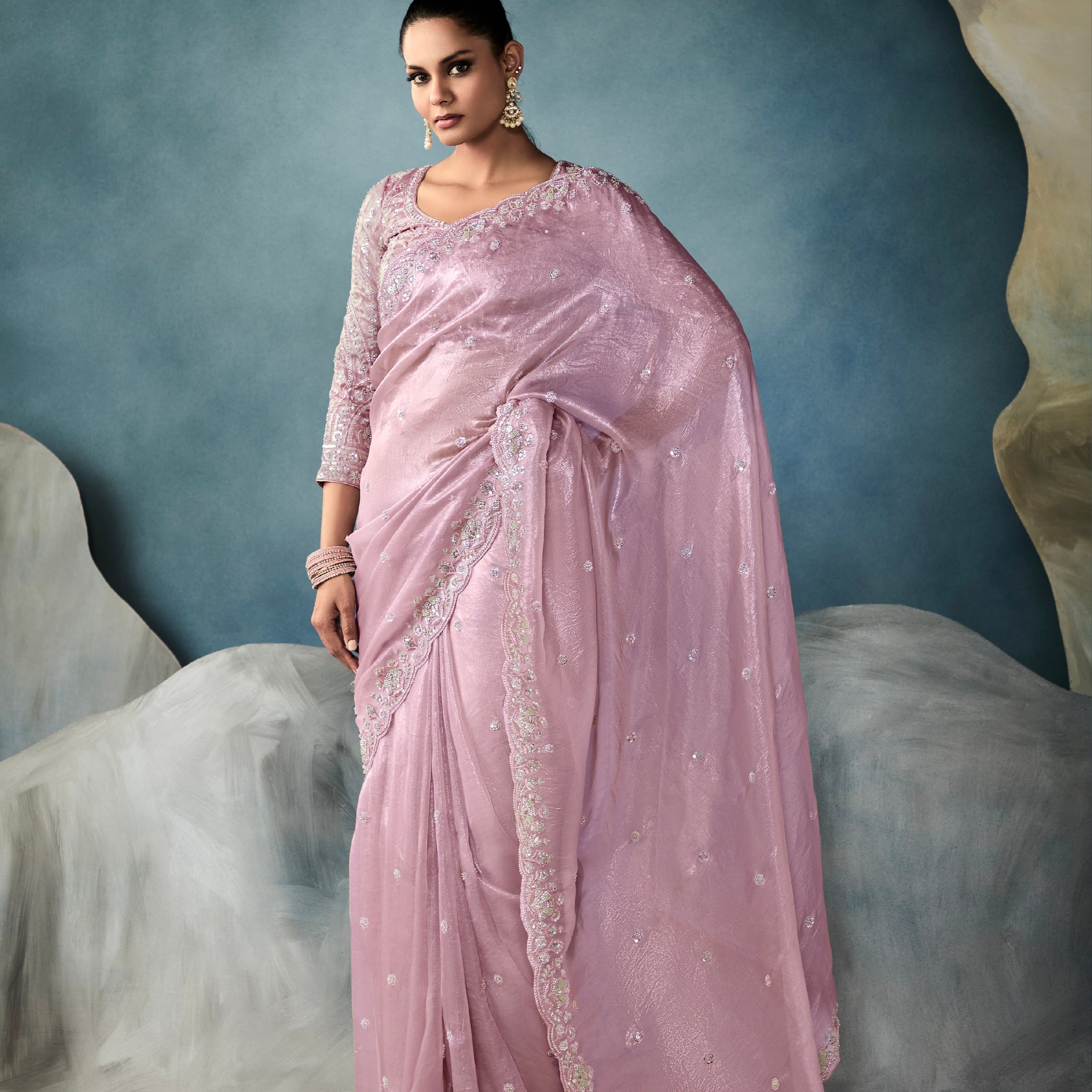 Mauve tissue saree with hand embroidery

