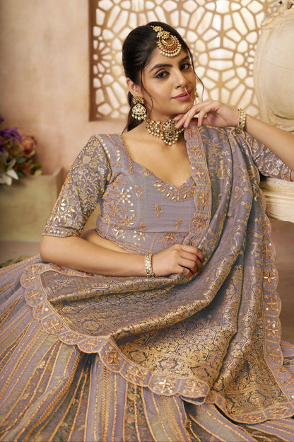 Pastel bridal lehenga with jacquard border detailing

