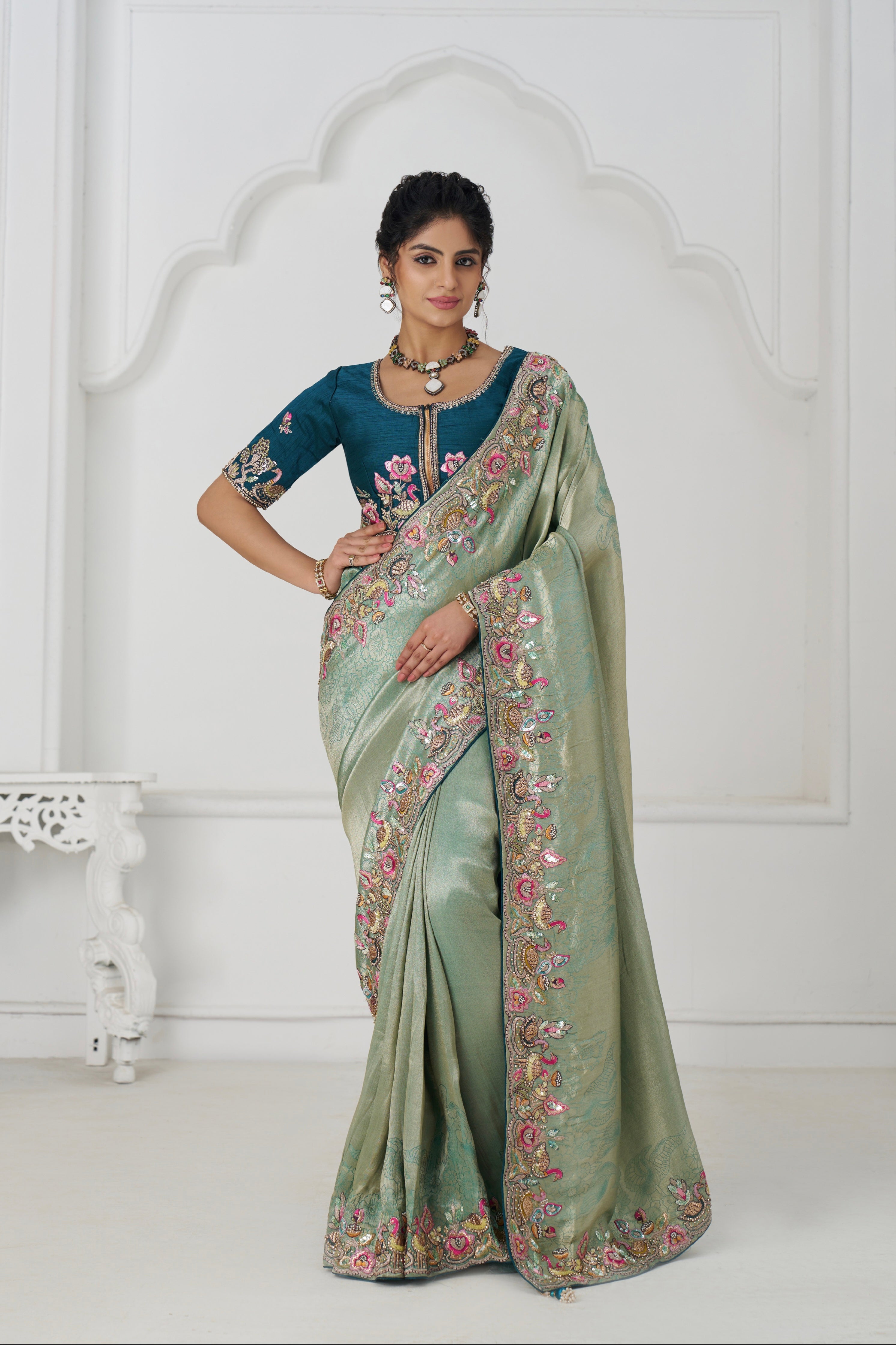 Traditional green saree for weddings and festive wear